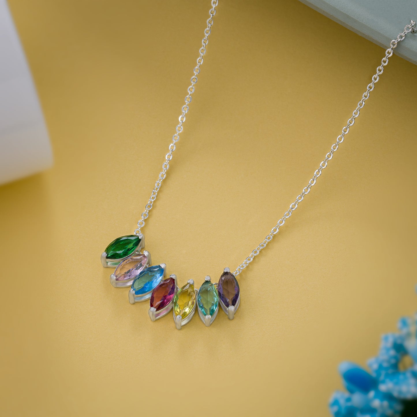 silver necklace with colorful stones