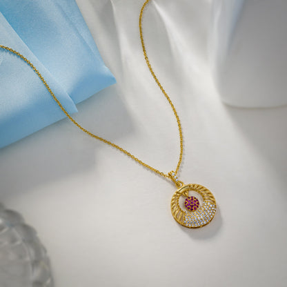 Golden Necklace with a Pink Stone and a Diamond Pendant