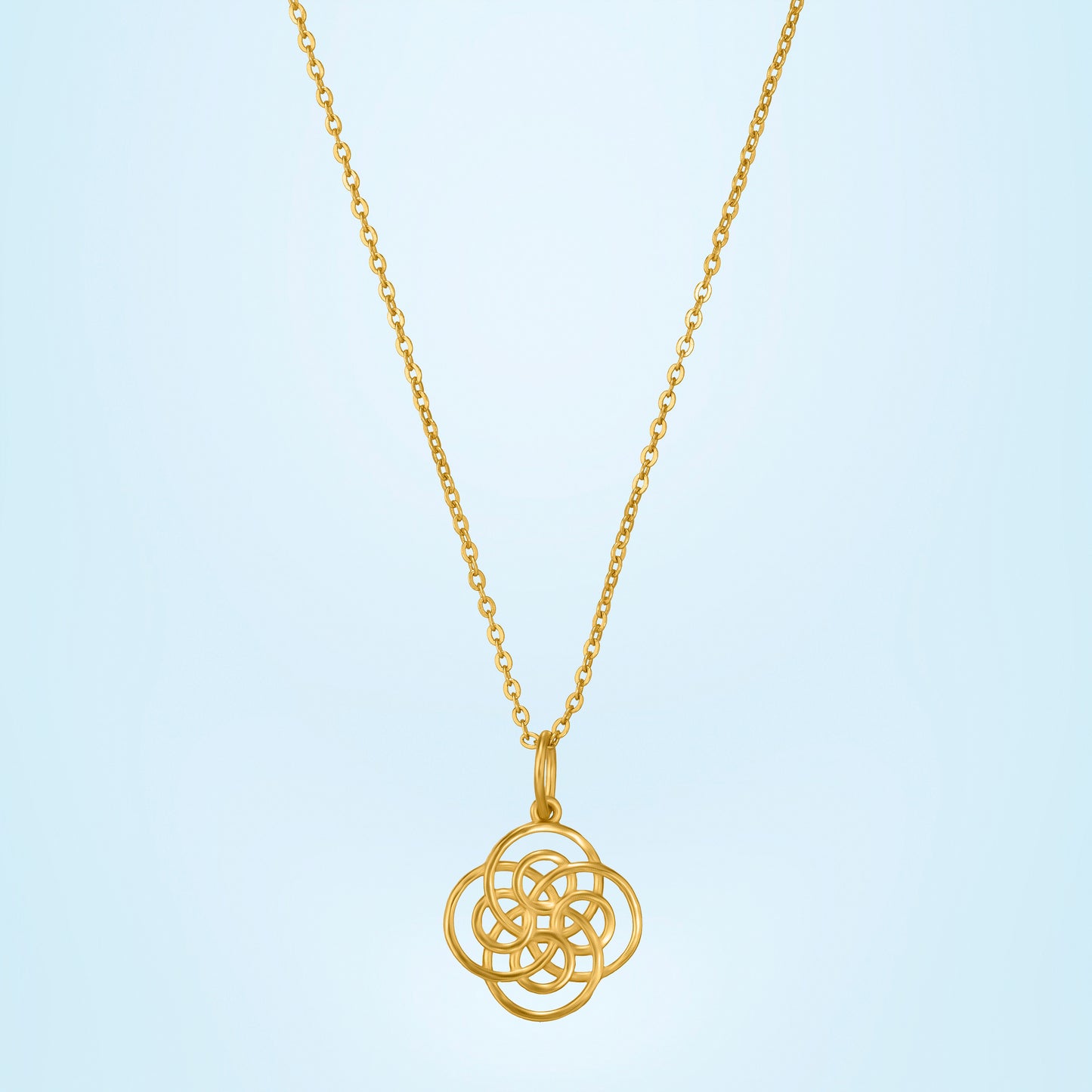 golden necklace with a knot on it