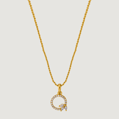 Golden Necklace with a Diamond Letter on it