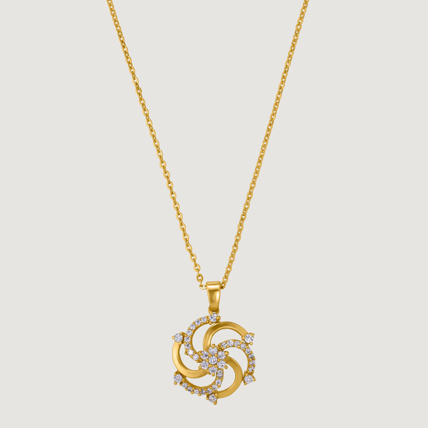 golden necklace with a diamond pendant