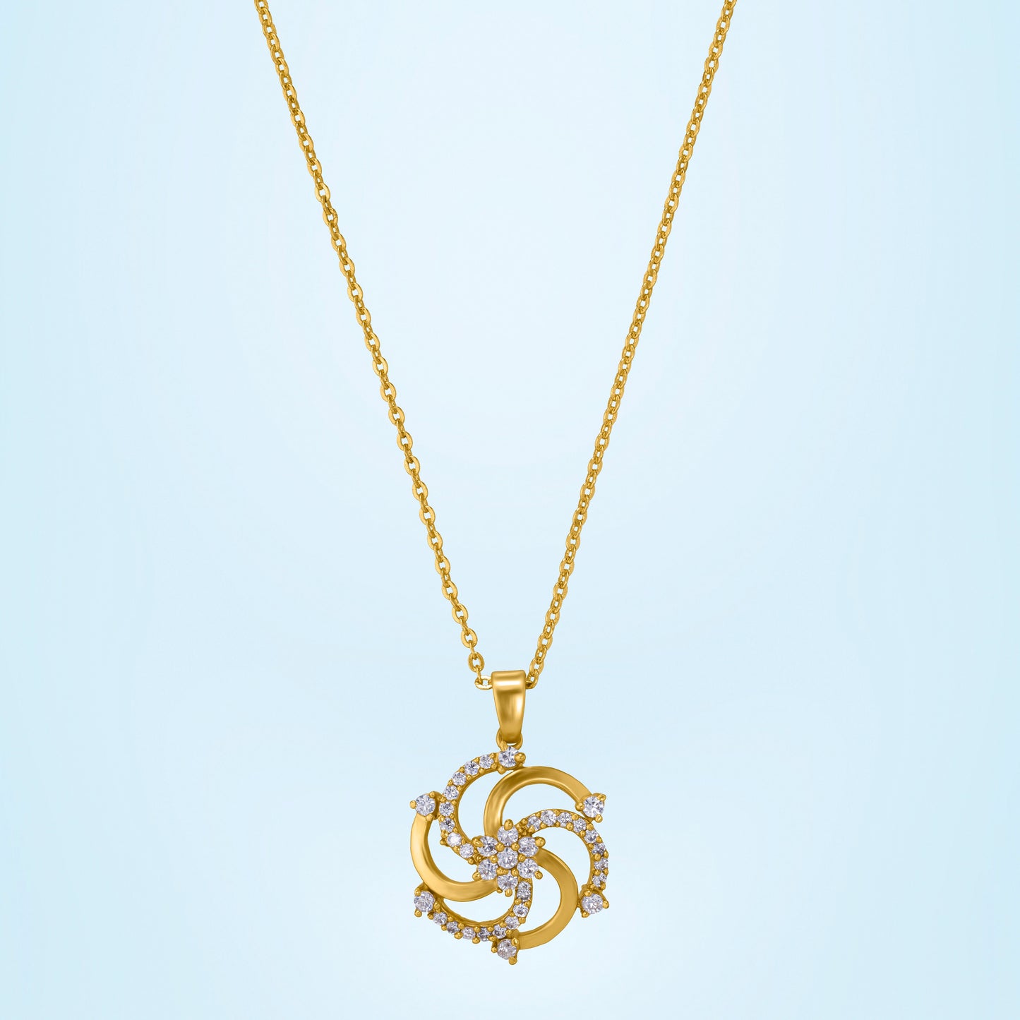 golden necklace with a diamond pendant