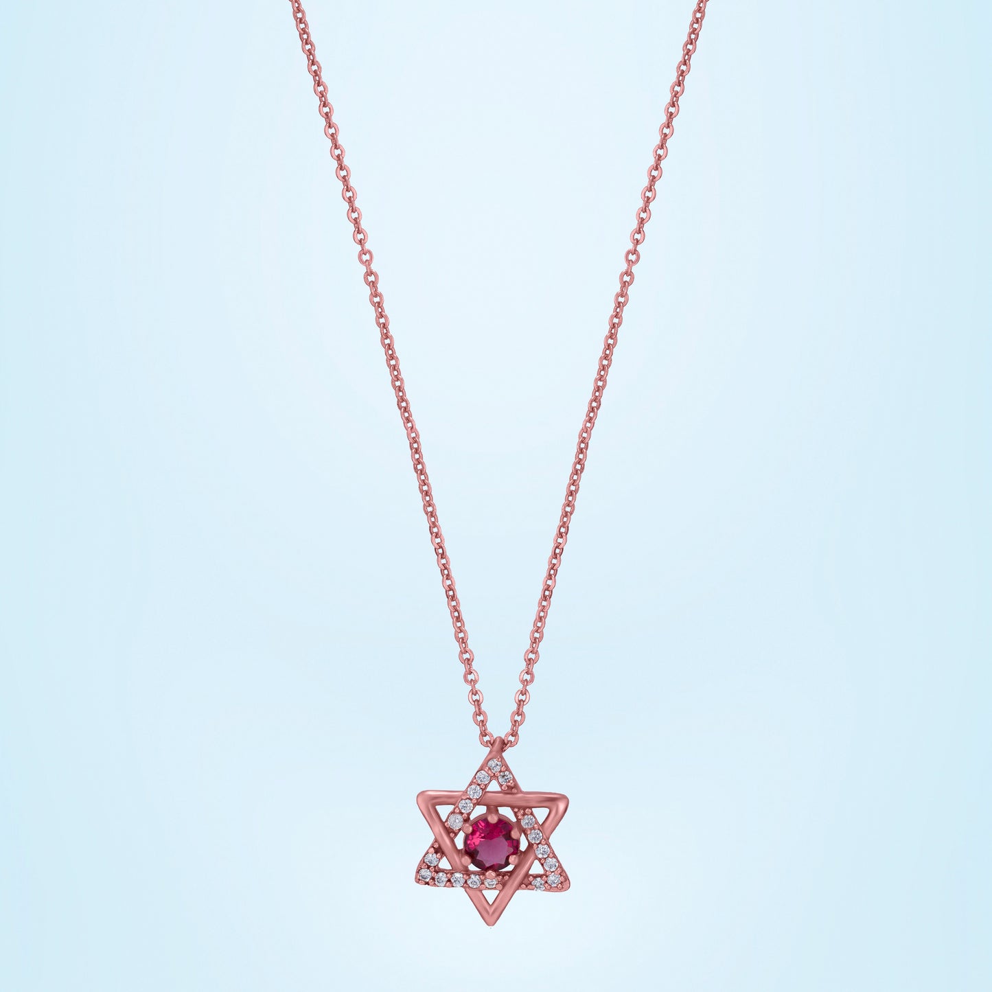 rose gold sapphire and diamond pendant with a star of david