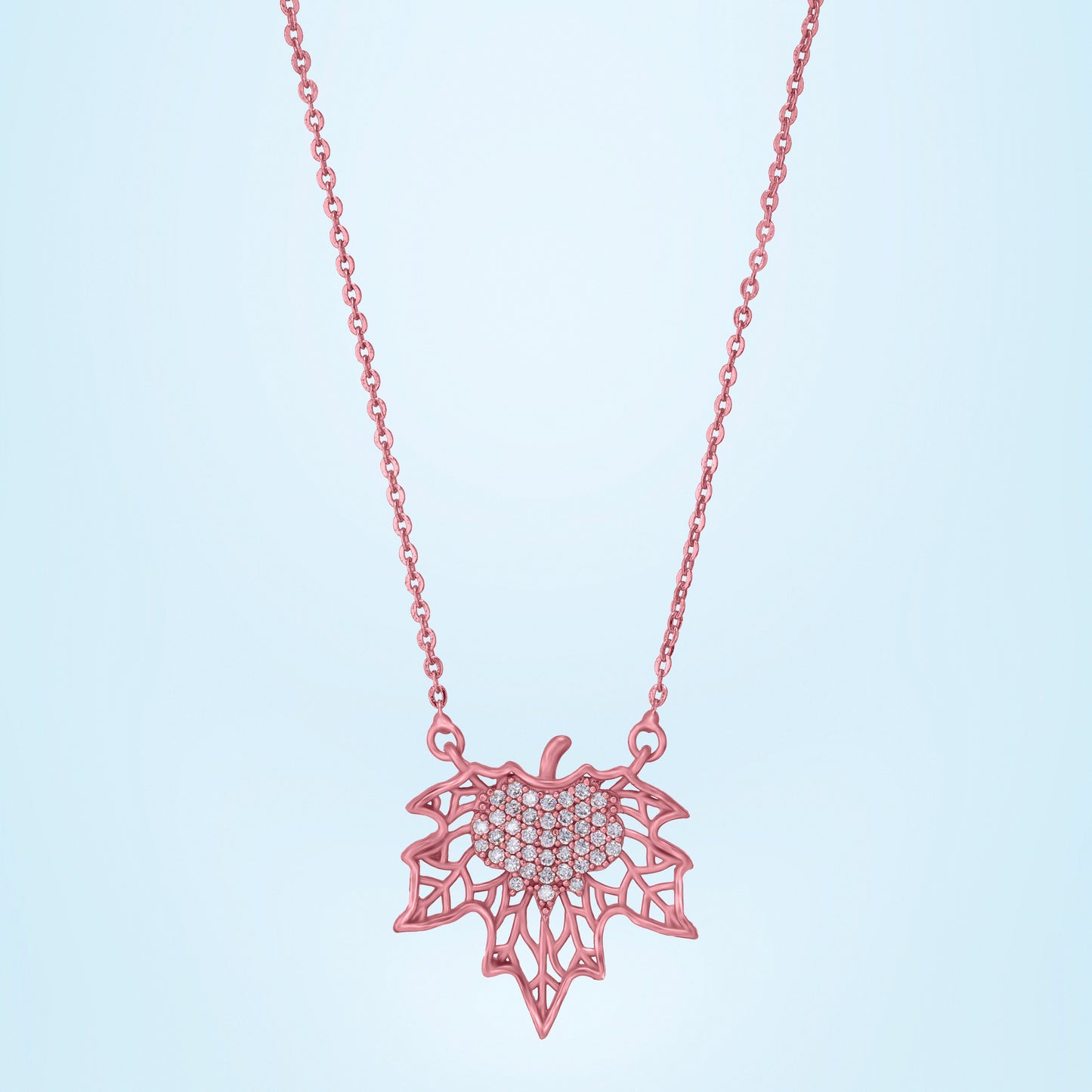 rose gold necklace with a diamond flower pendant