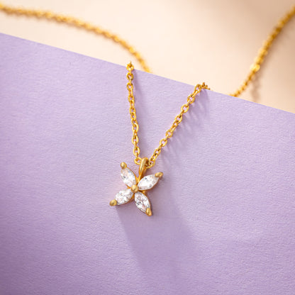 Golden Necklace with a Small White Diamond