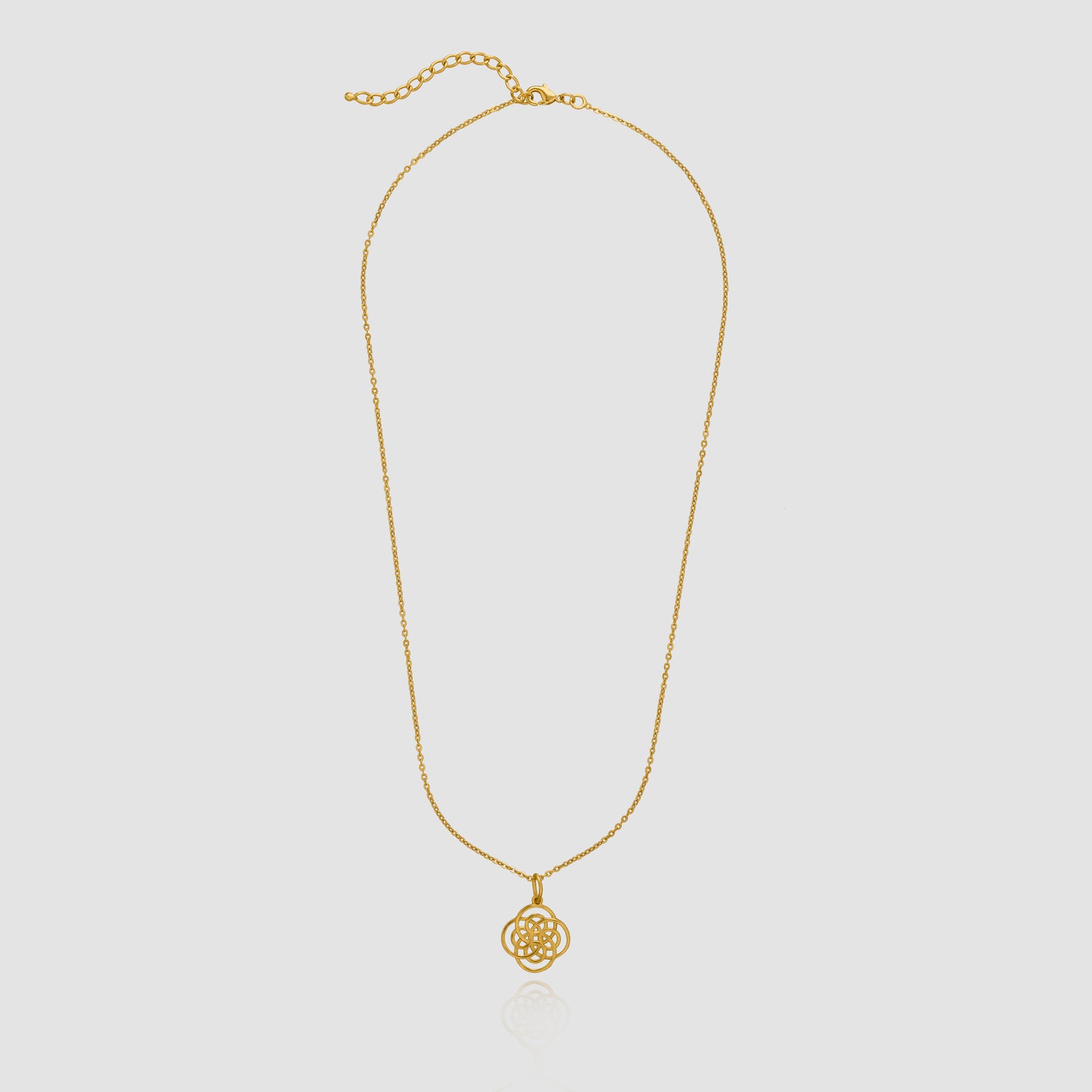 golden necklace with a knot on it