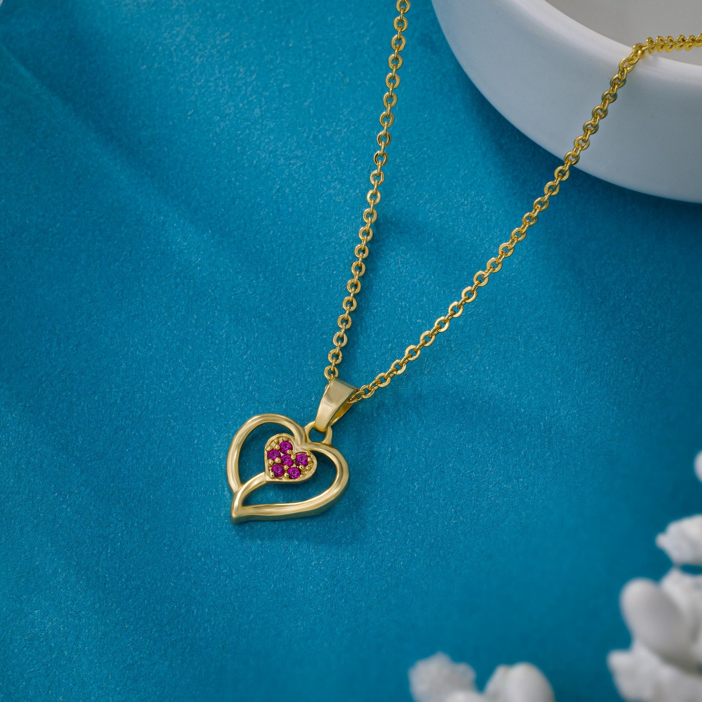 golden necklace with heart pendant