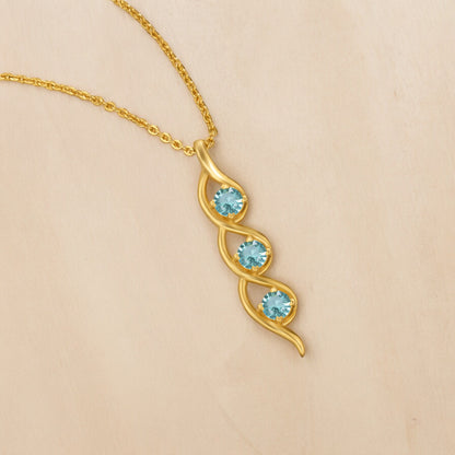 Golden Necklace with a Rainbow Stone Pendant