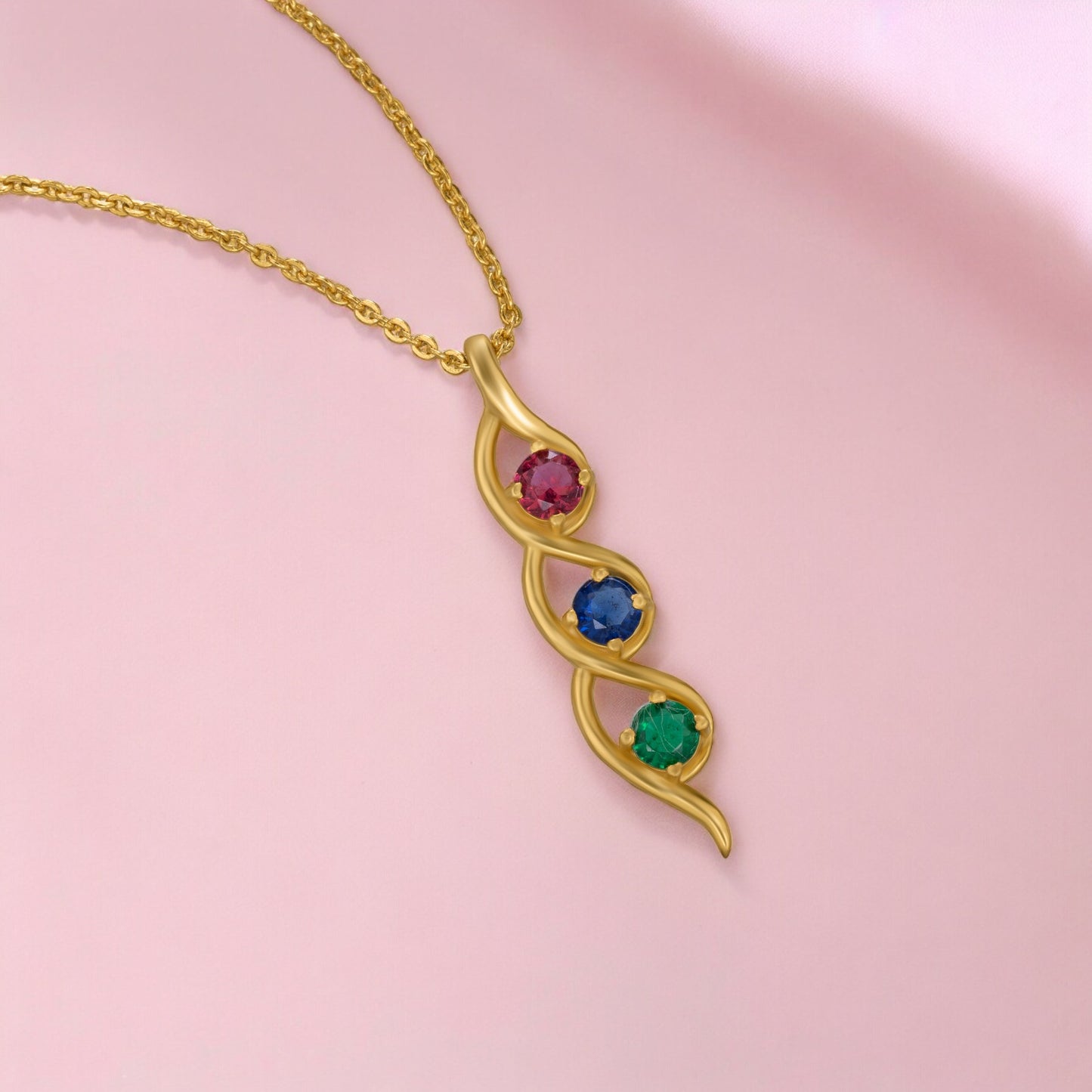 golden necklace with a rainbow stone pendant