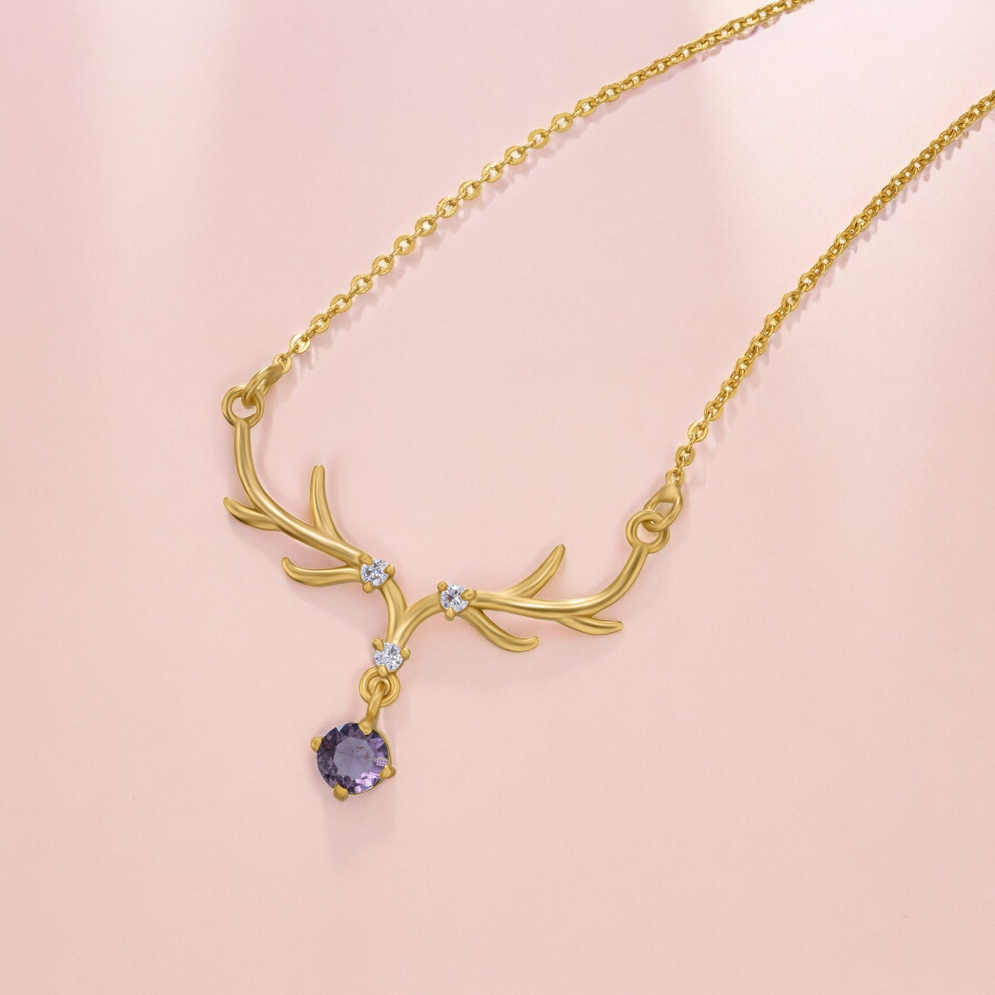 the golden deer necklace with a stone