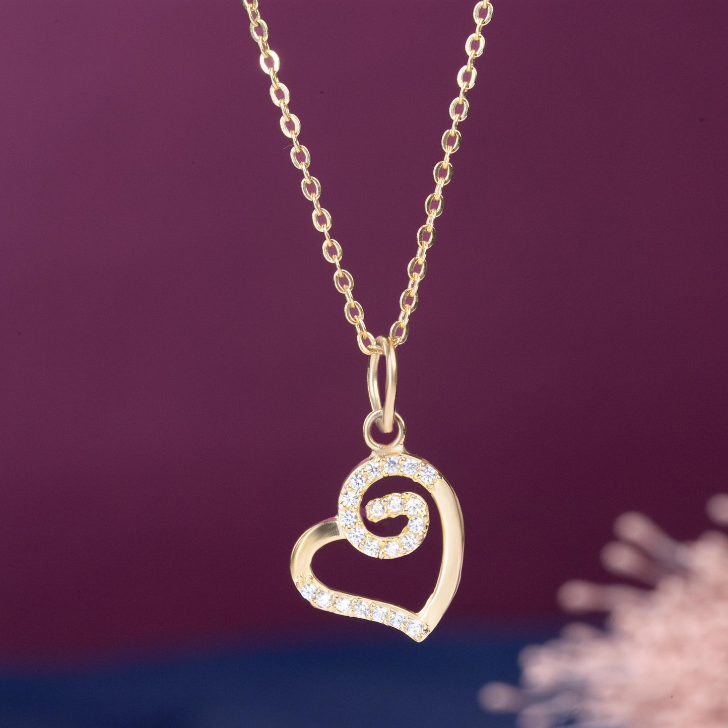 golden heart pendant with diamonds