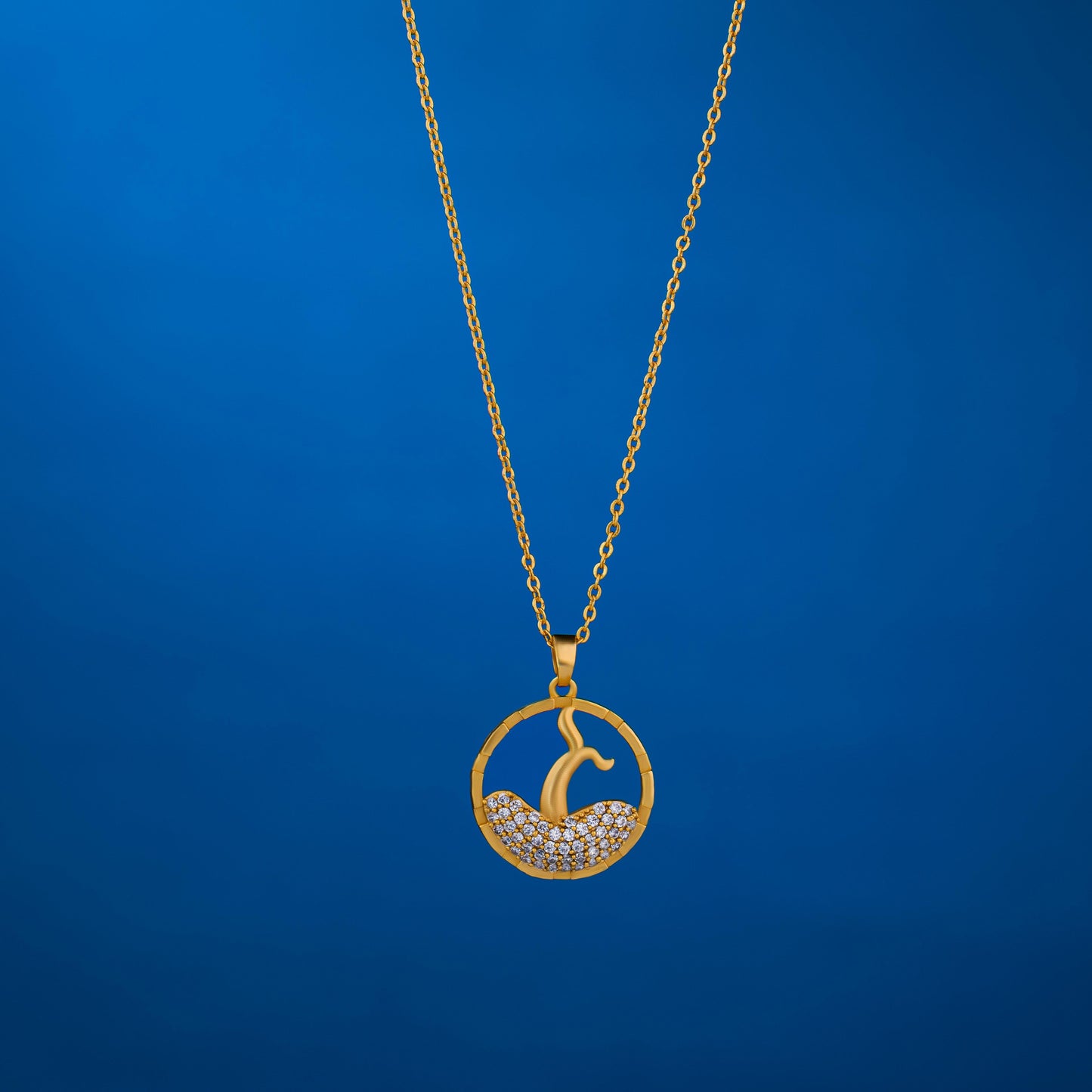 golden necklace with a diamond pendant