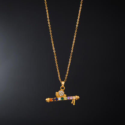 Golden Necklace with a Flute Pendants