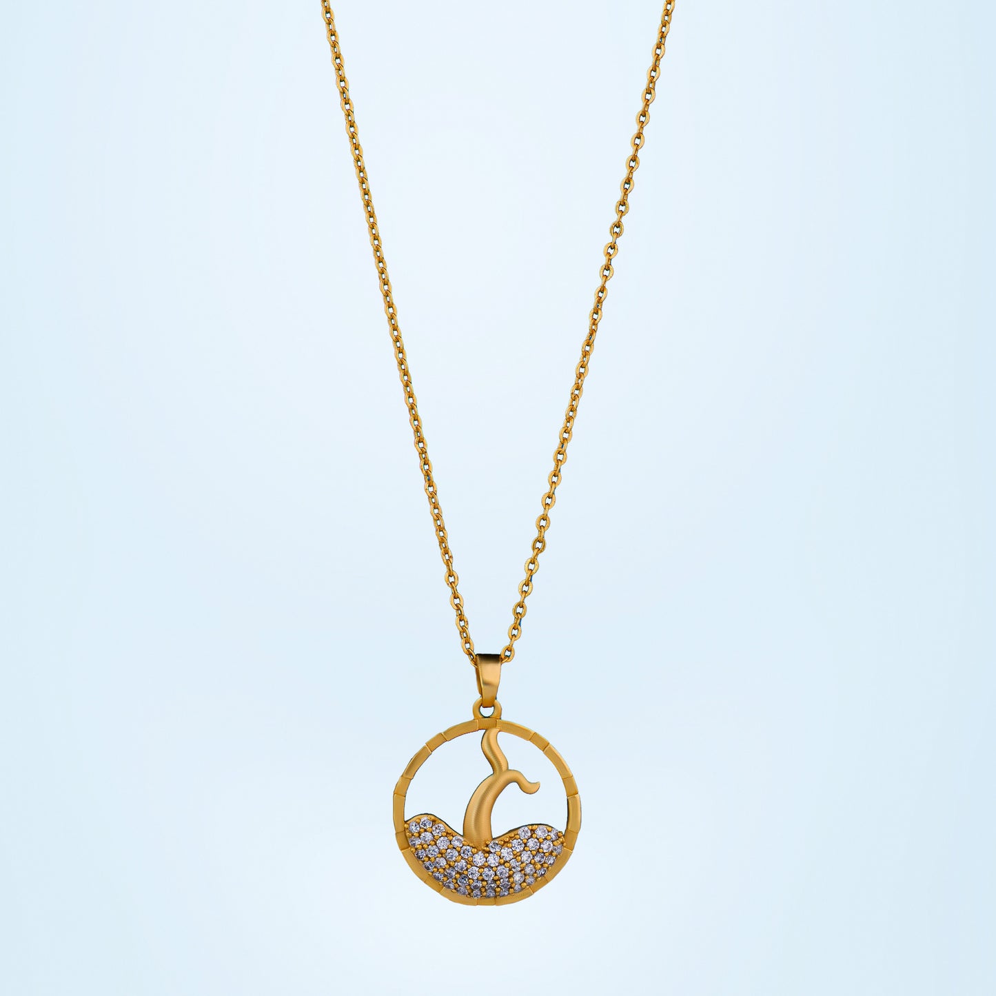 golden necklace with a diamond pendant