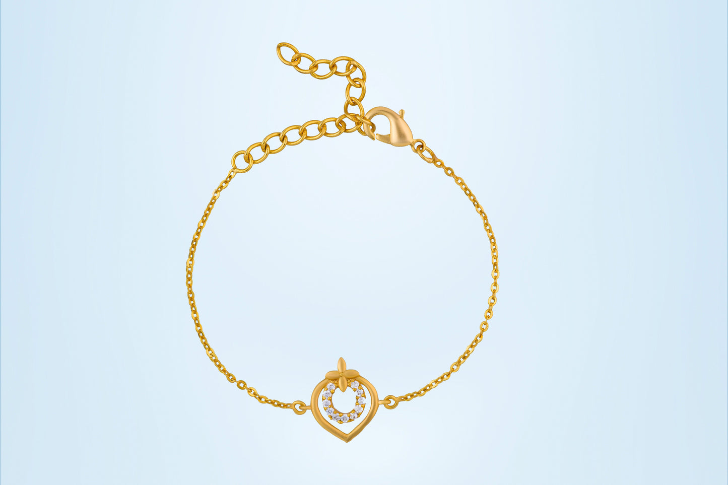 golden bracelet with a heart charm