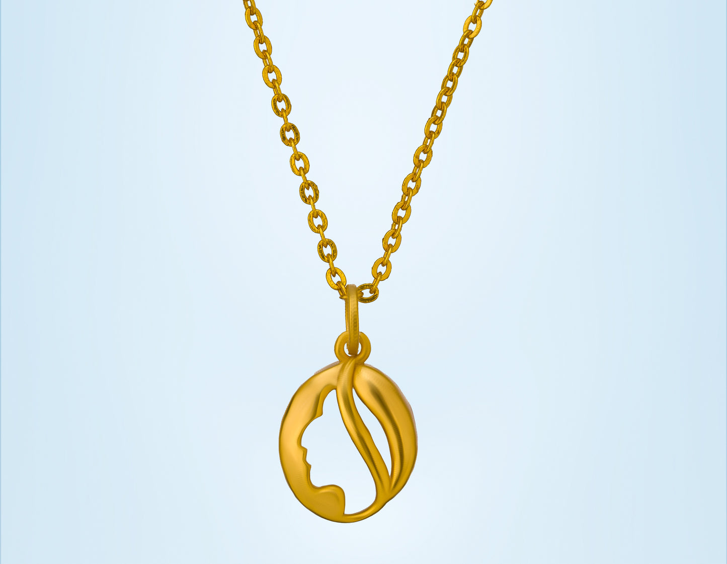 golden necklace with a woman head pendant