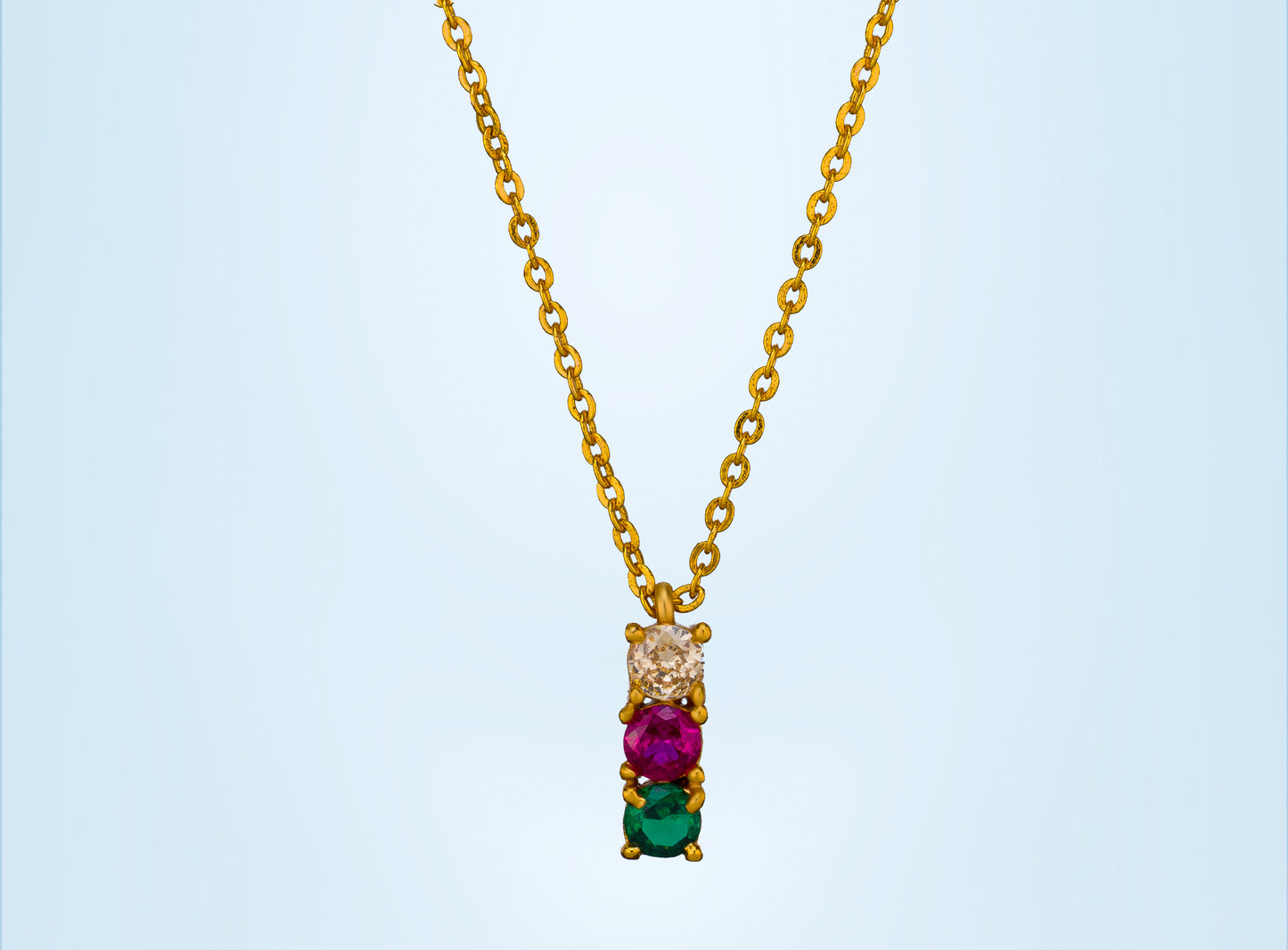 golden necklace with multicolur stones