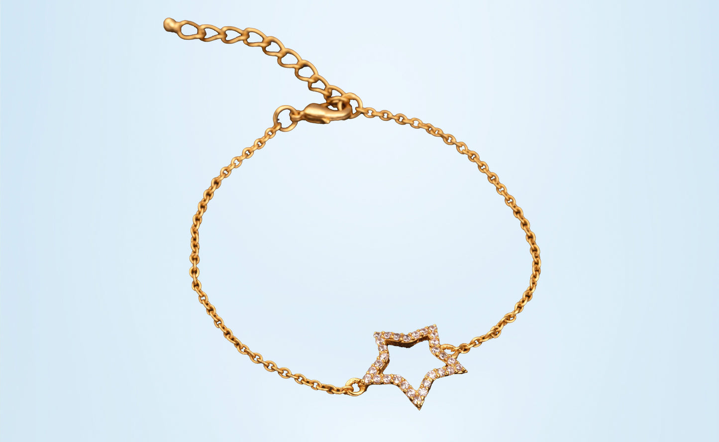 golden bracelet with a star charm