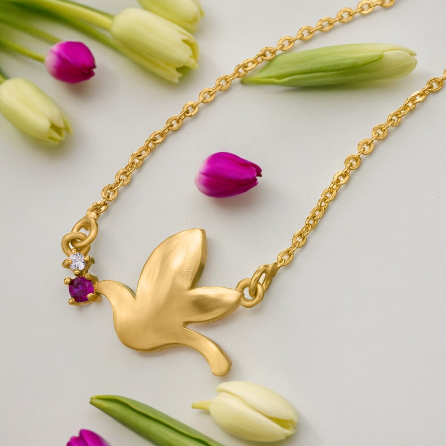 new heights with this enchanting golden bird necklace