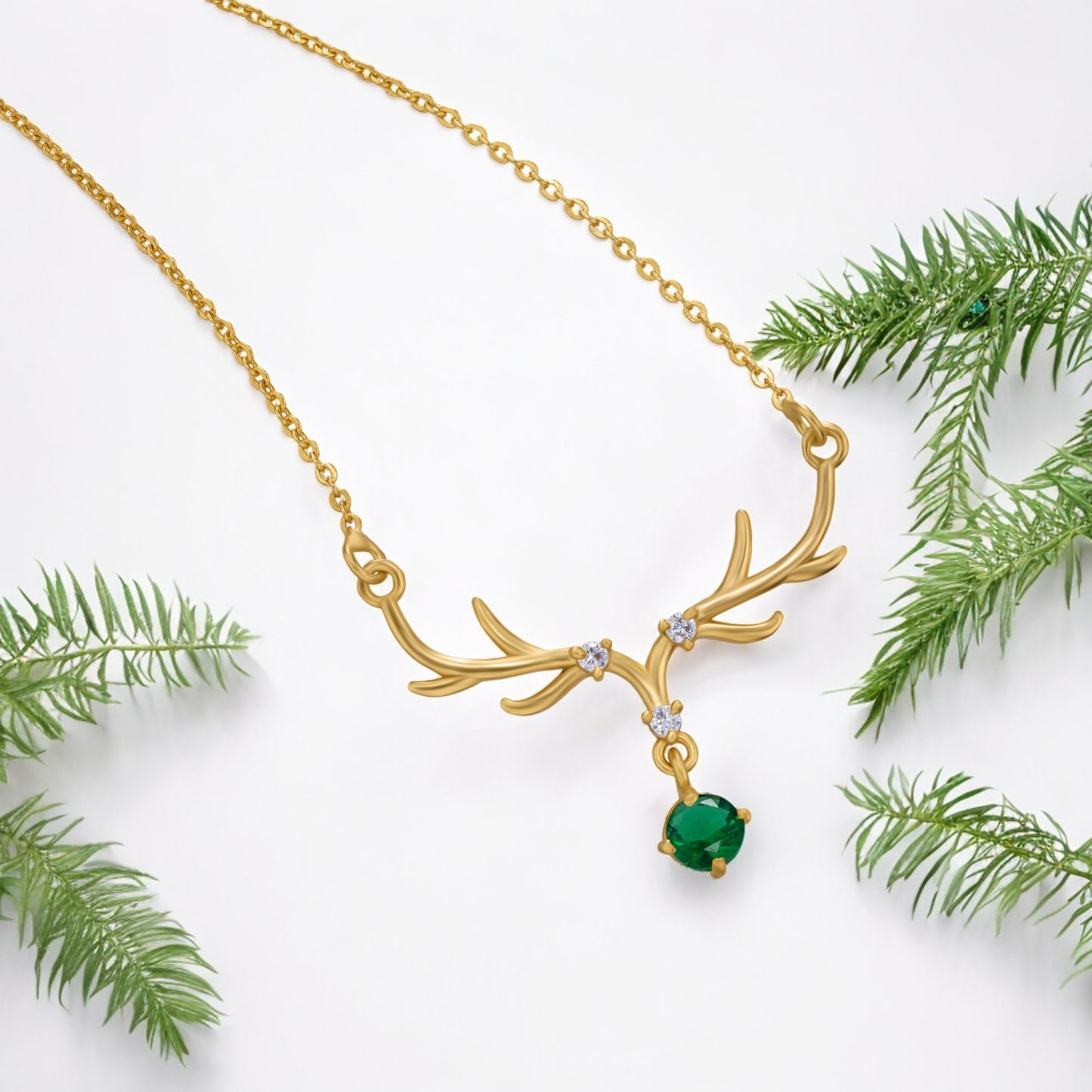 the golden deer necklace with a stone