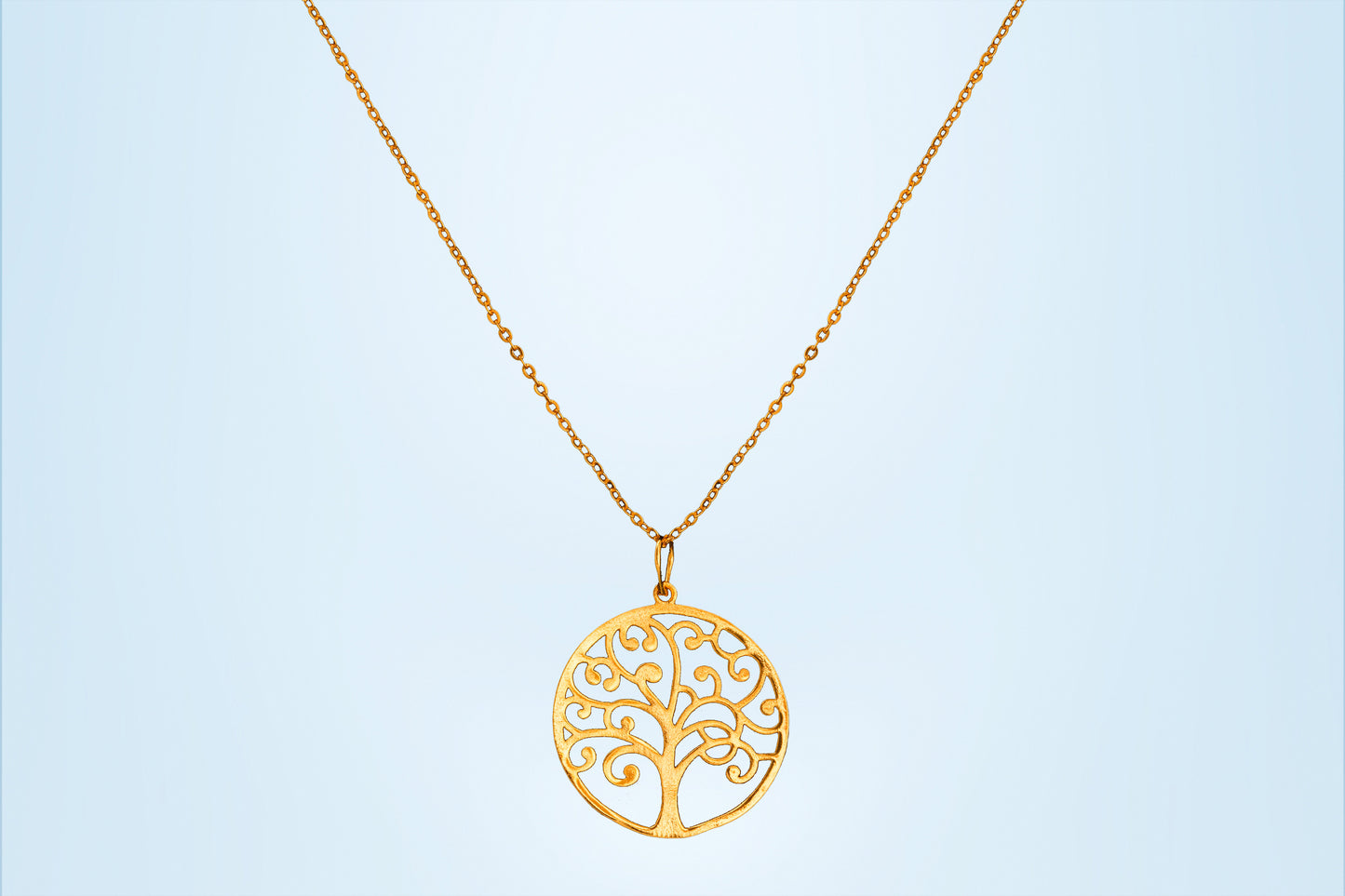 golden necklace with tree of life pendant