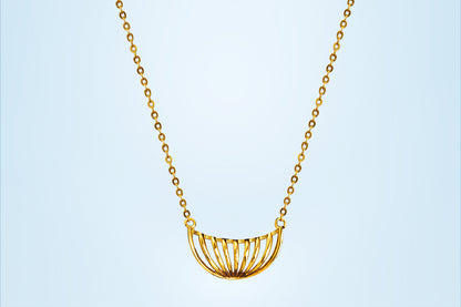 Golden Necklace with a Large Curved Design