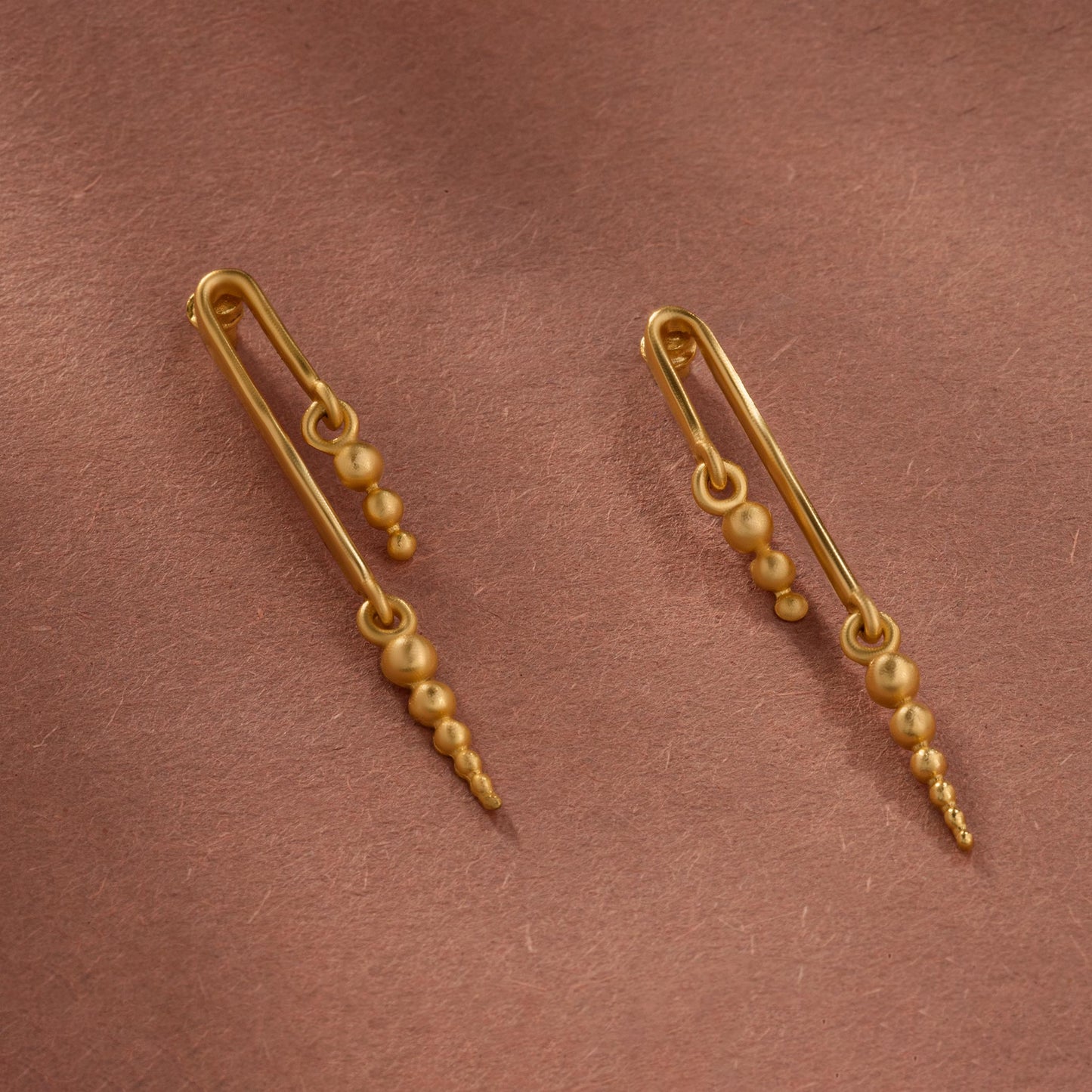 pair of golden beads earrings