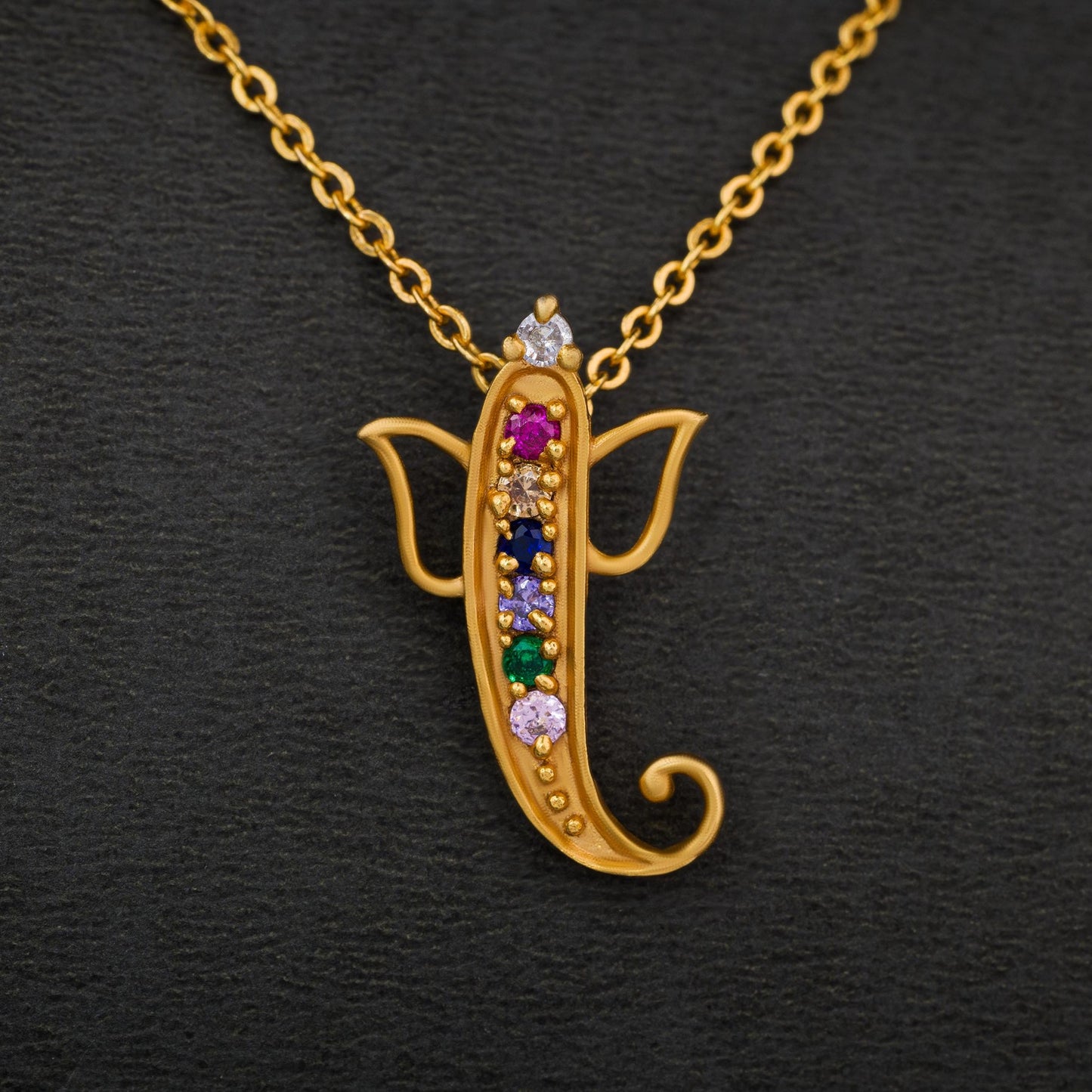 golden elephant necklace with stones