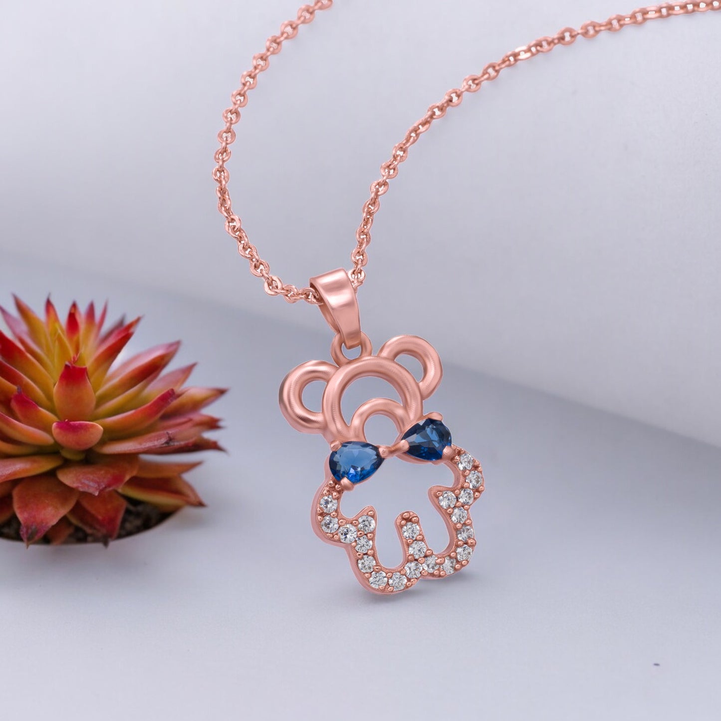 rose gold dripping in blue diamond necklace