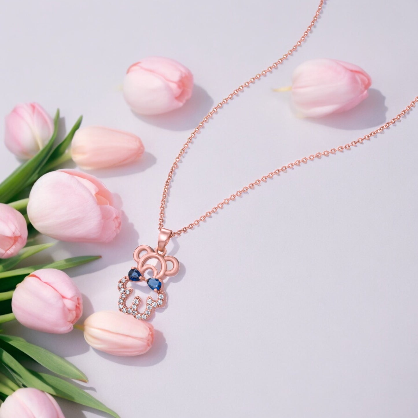 rose gold dripping in blue diamond necklace