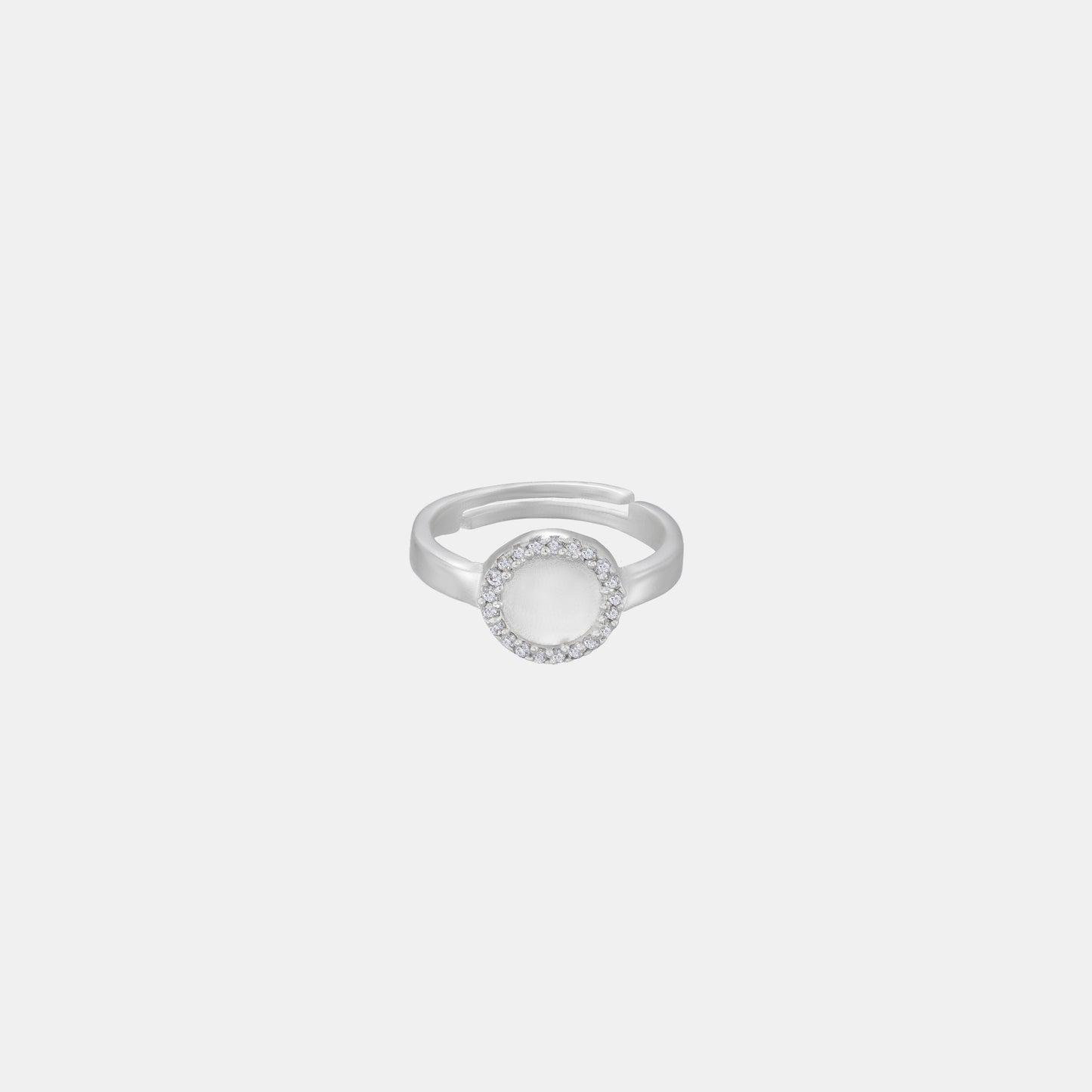 silver ring with a diamond and a small round stone