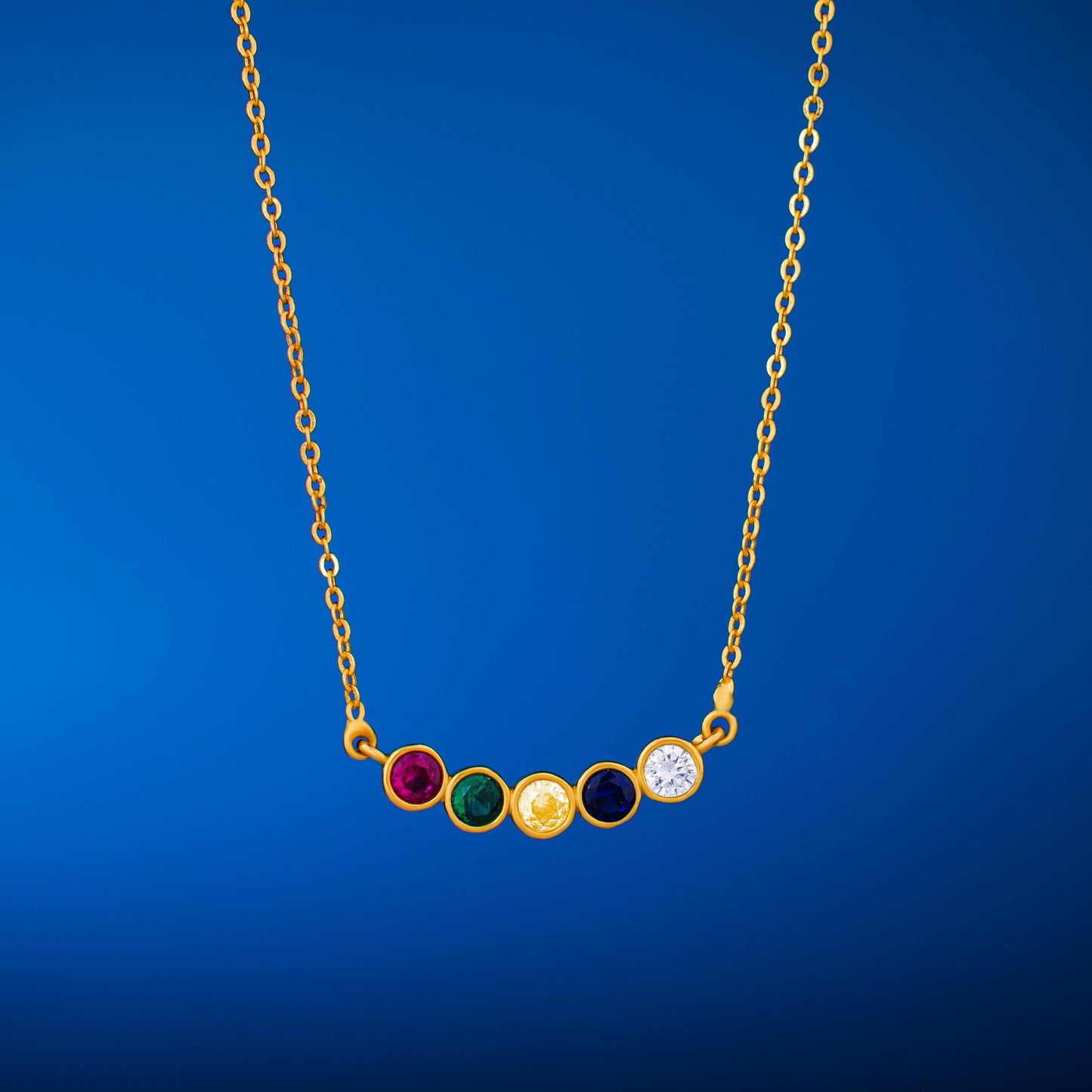 golden necklace with multicolor stones