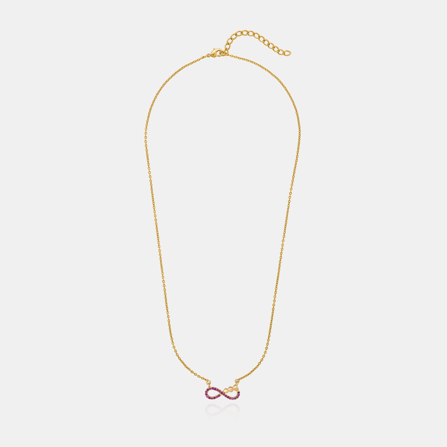 shine bright with this stunning golden necklace featuring a red infinity