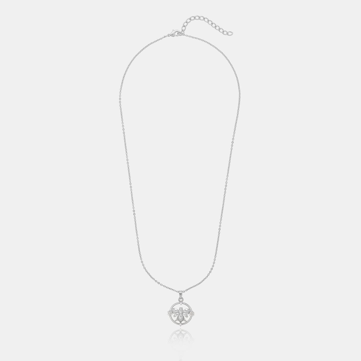 silver necklace with a turtle on it