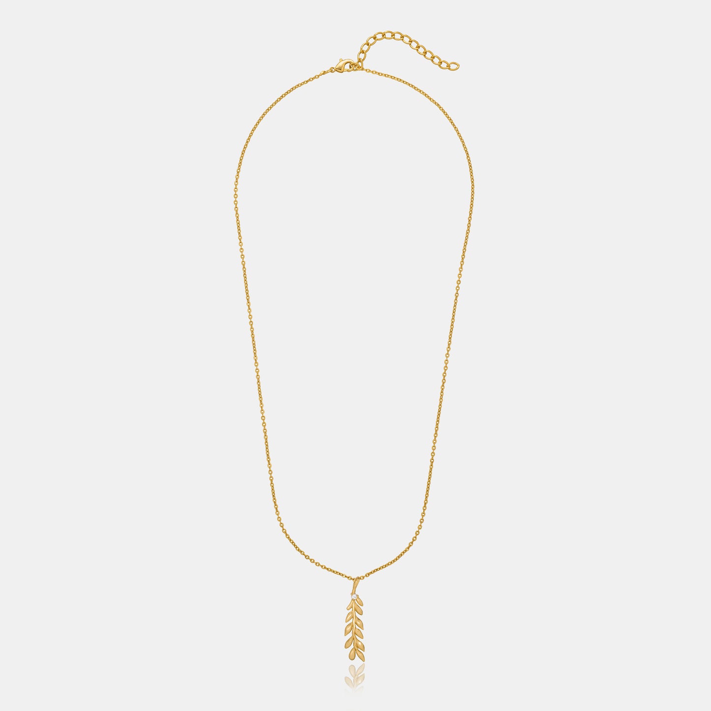 golden necklace with leaf pendant