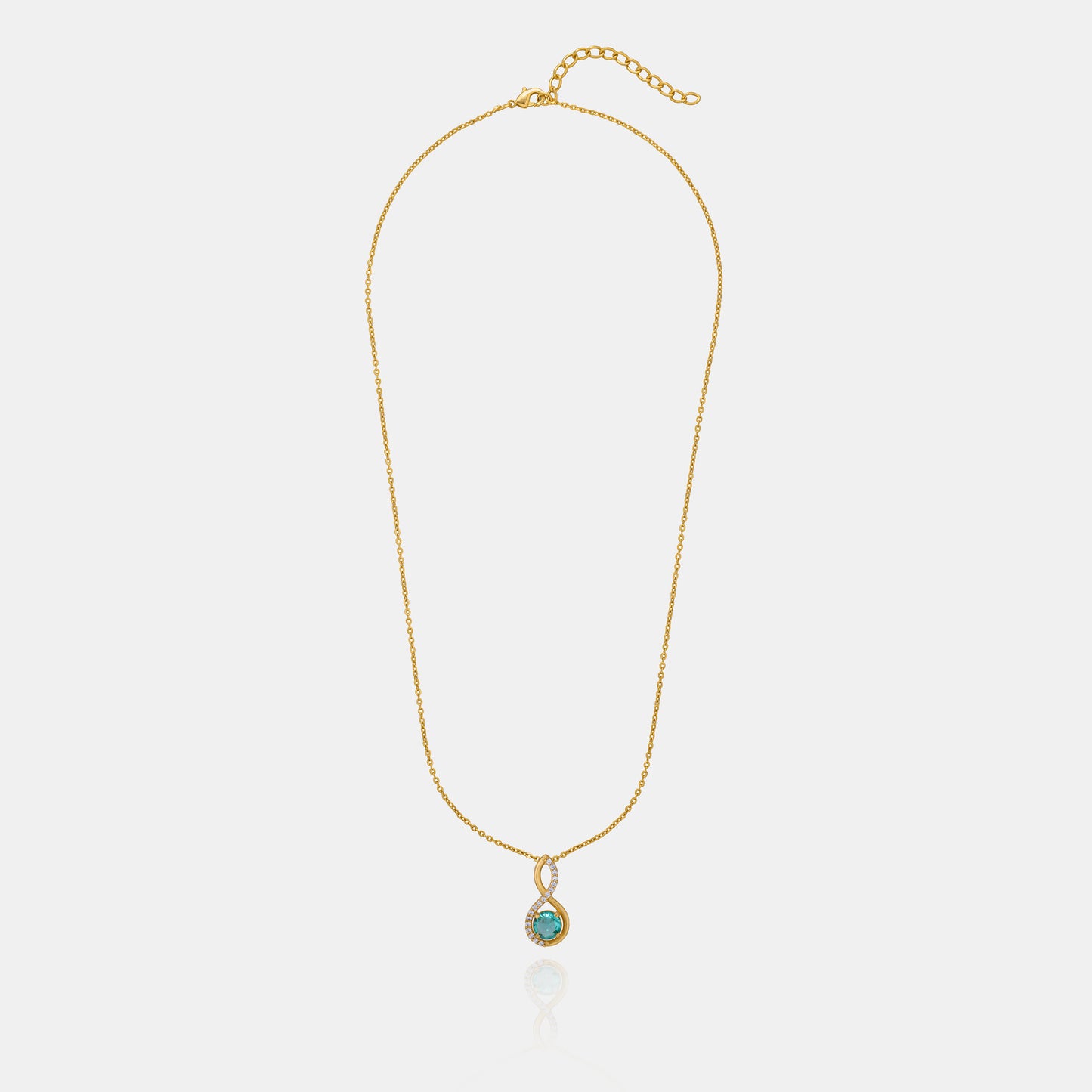 golden necklace with a stone and diamonds