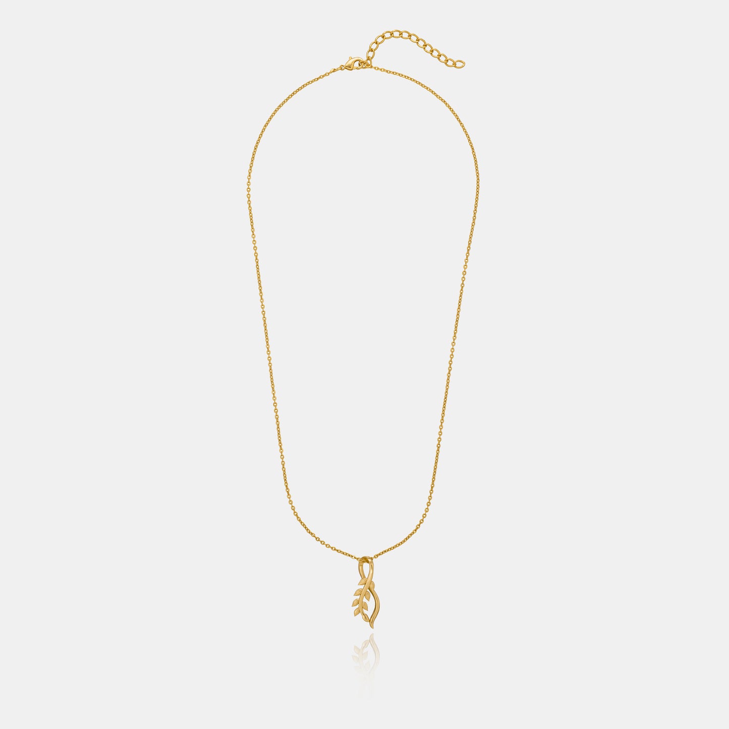 golden necklace with a small leaf on it