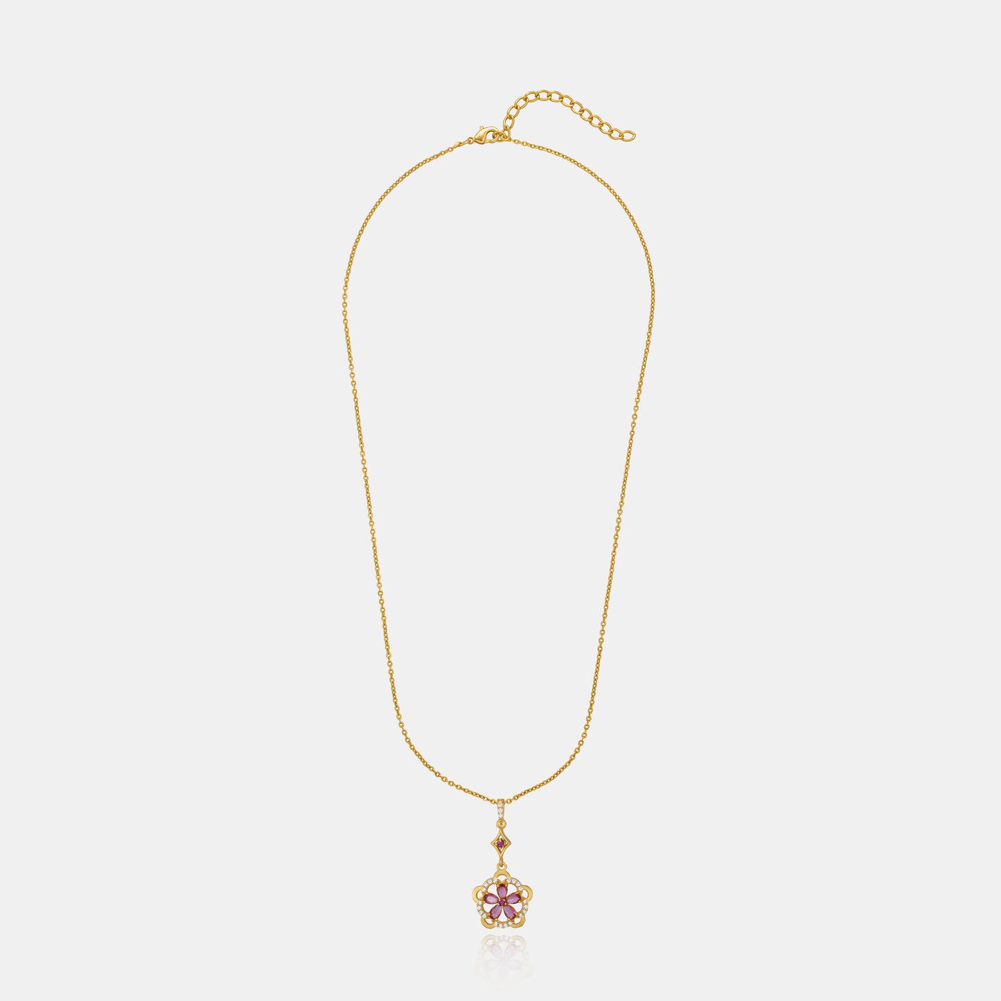 golden necklace adorned with a striking red flower pendant