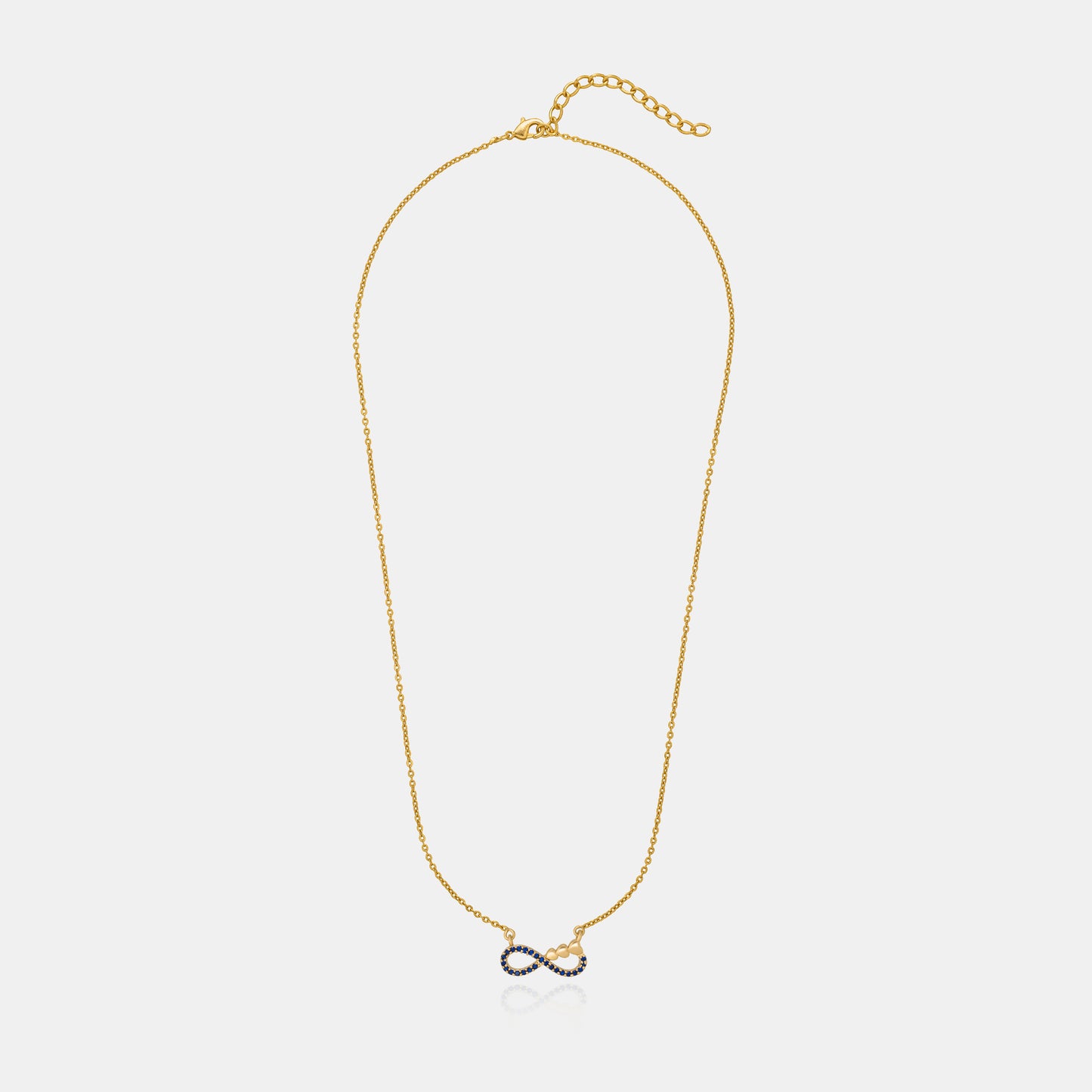 shine bright with this stunning golden necklace featuring a blue infinity