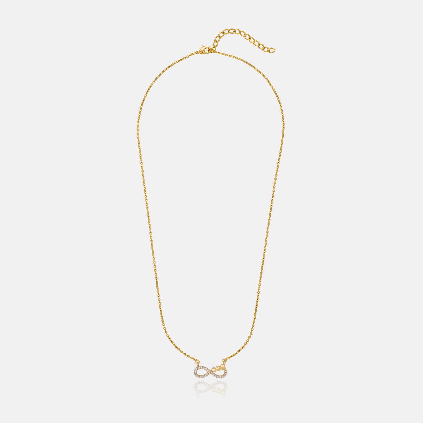 shine bright with this stunning golden necklace featuring a white infinity