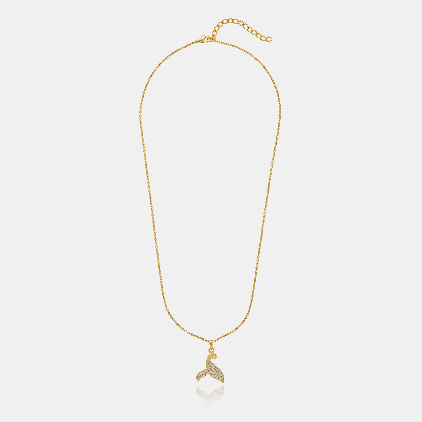 golden necklace with a diamond dolphin pendant