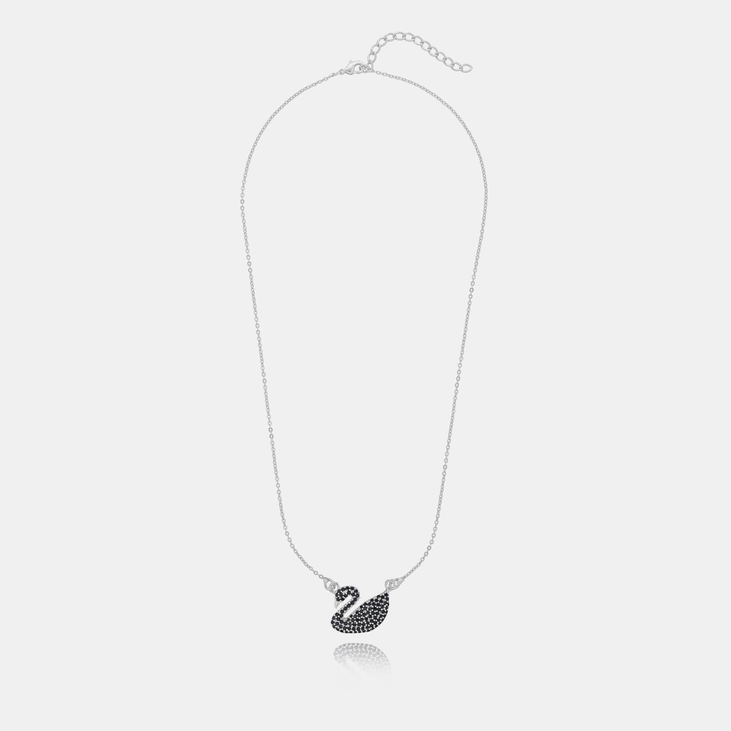 silver necklace with a stone swan