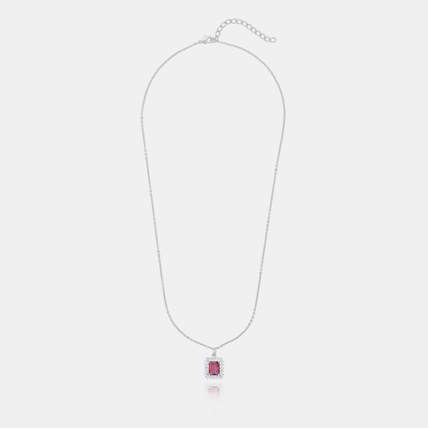 silver necklace with a red color stones