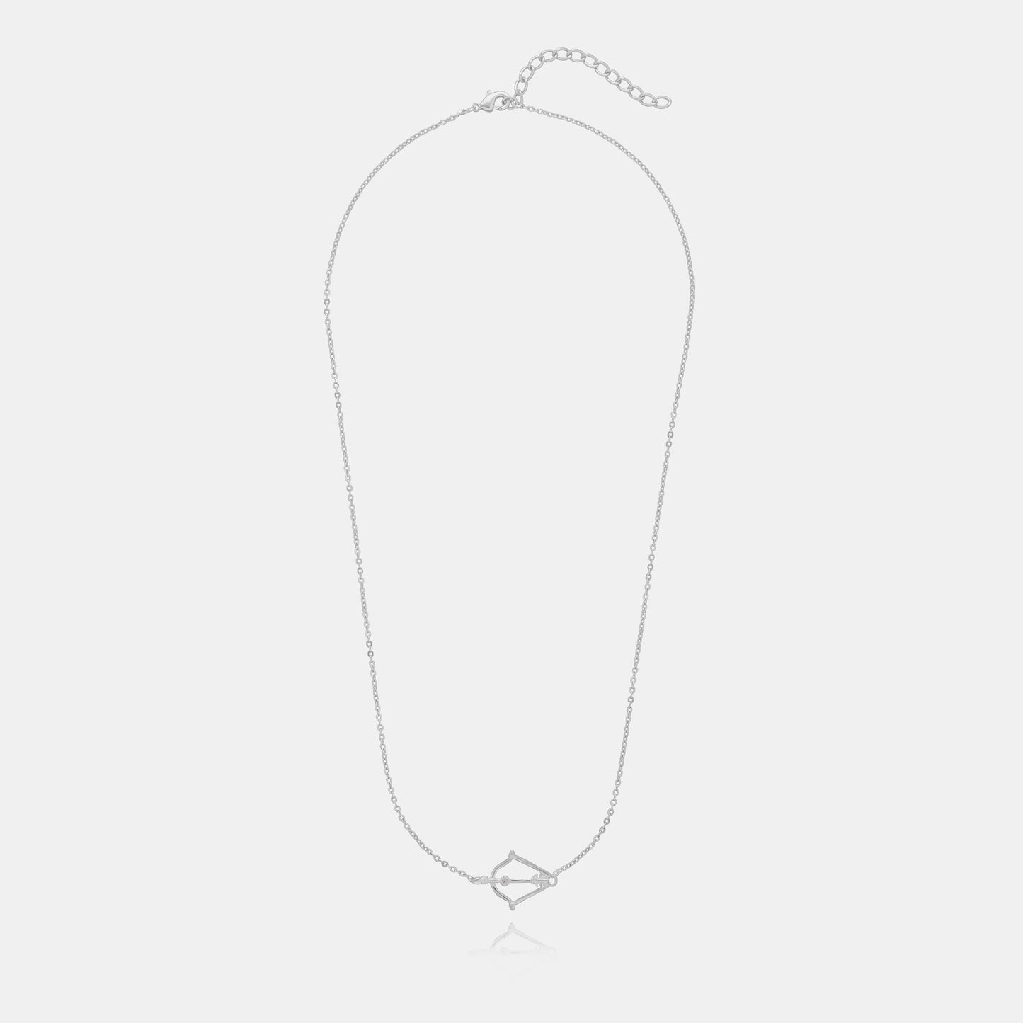 silver necklace with a small arrow on it