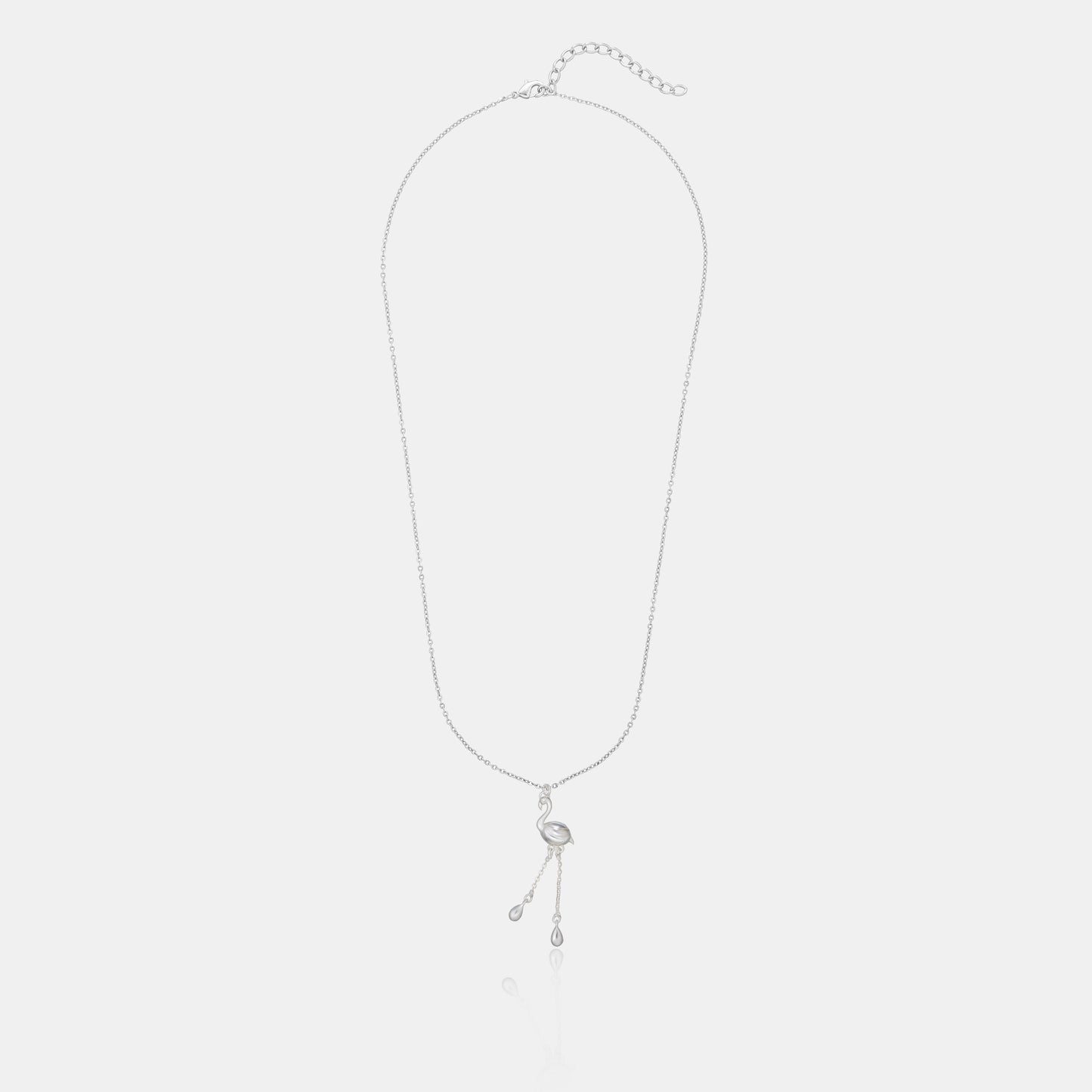 silver necklace with a small bird