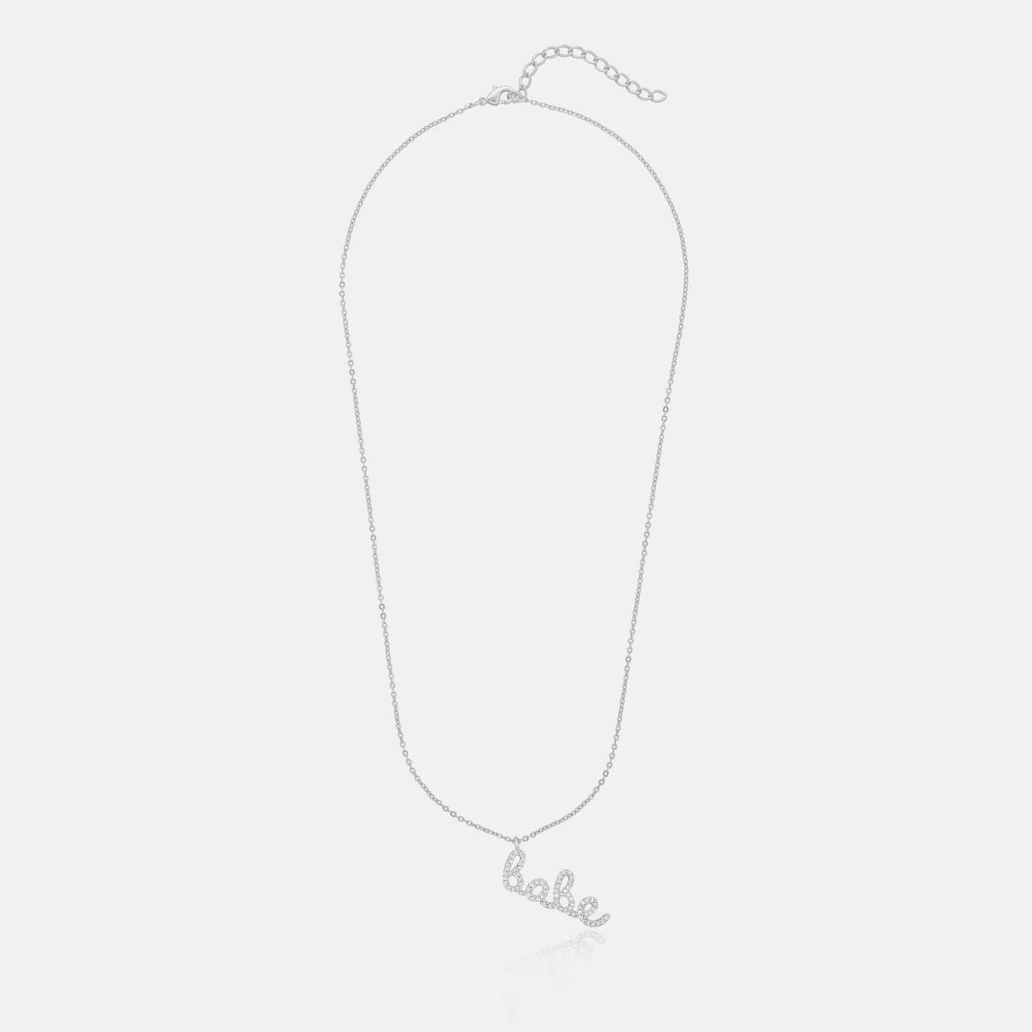 silver necklace with the word love on it