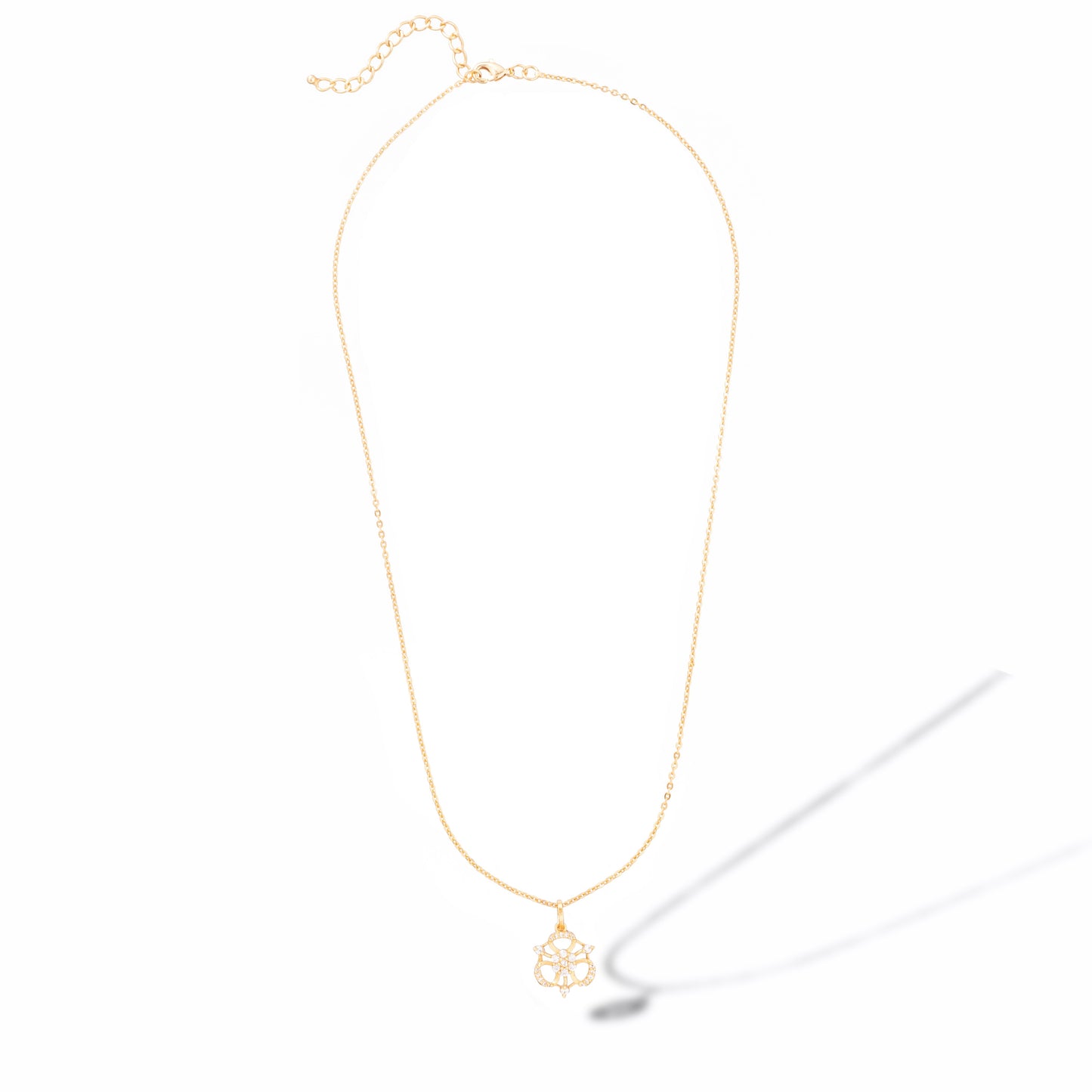 golden necklace with flower pendent