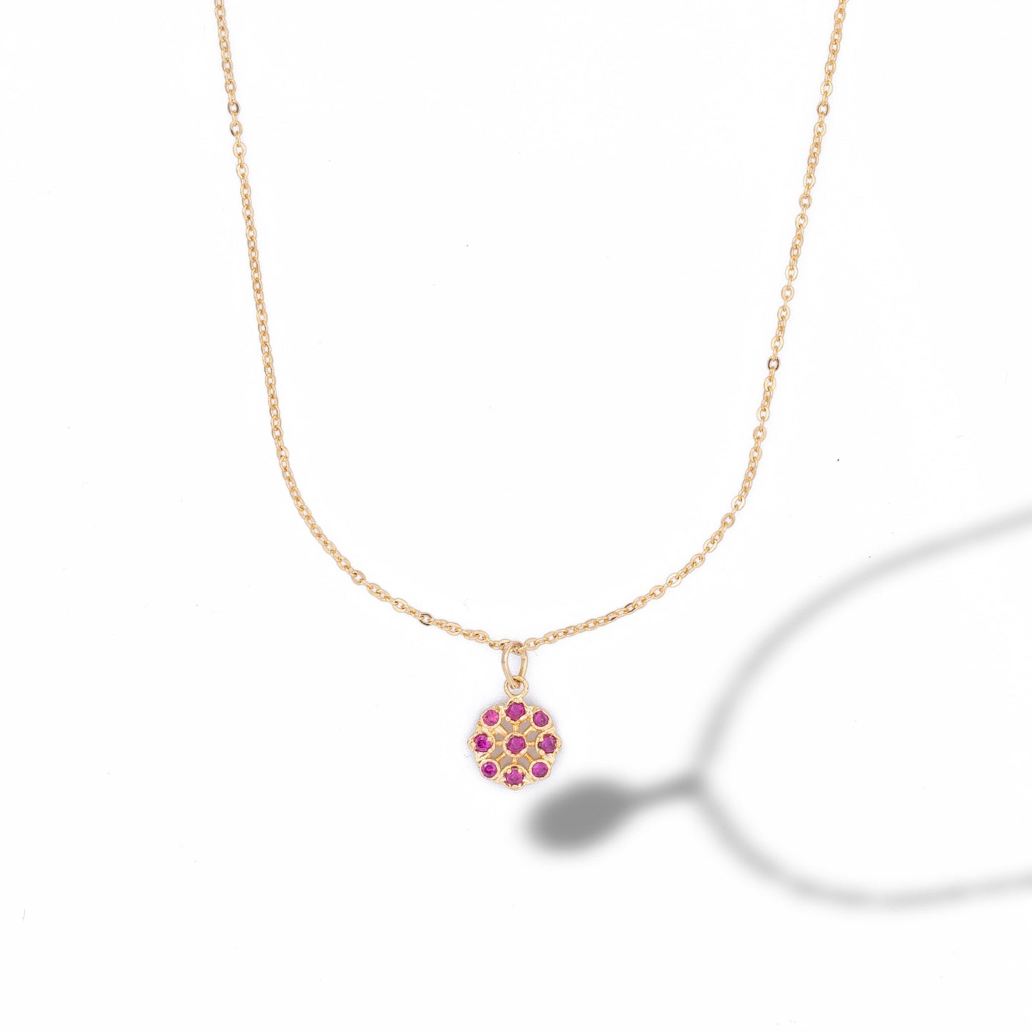 golden necklace with a flower design