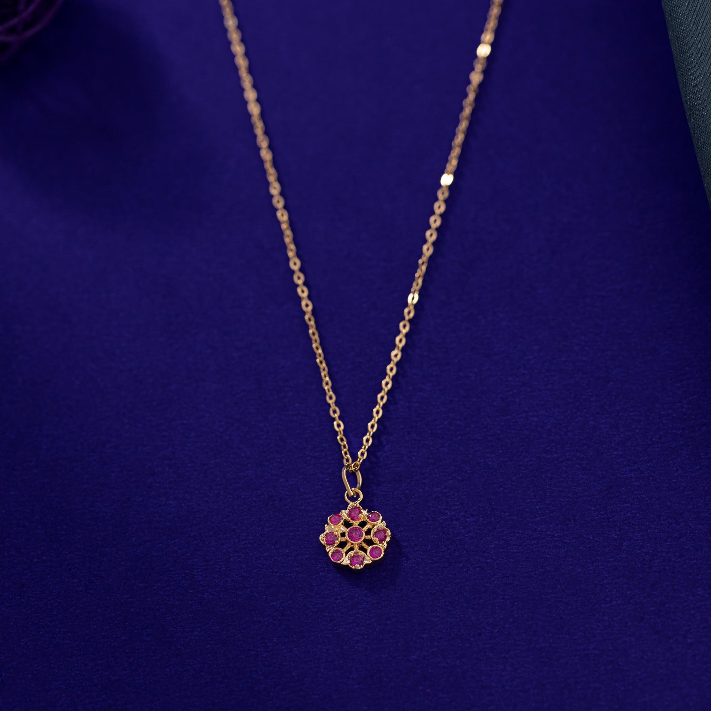 golden necklace with a flower design