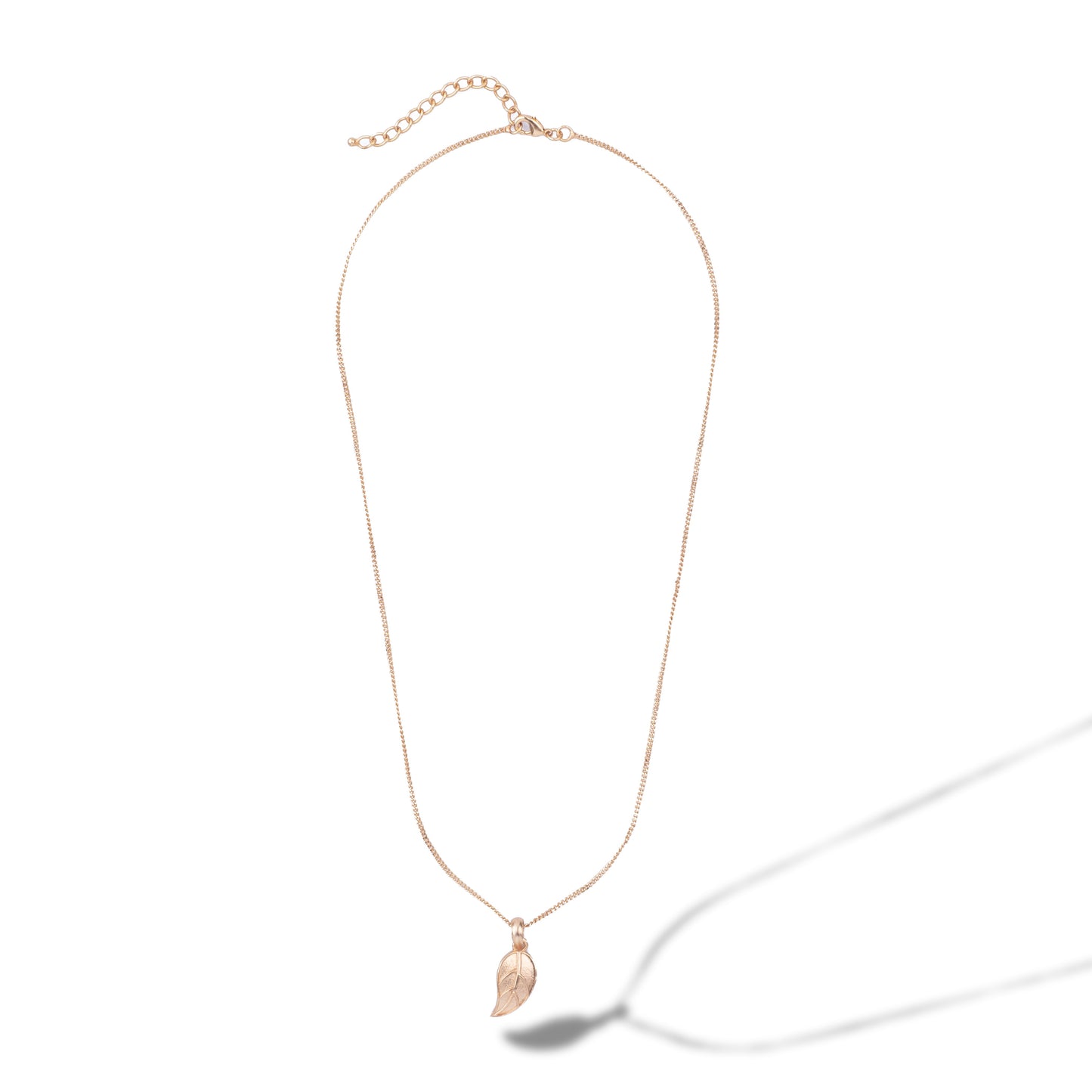 golden necklace with leaf pendant